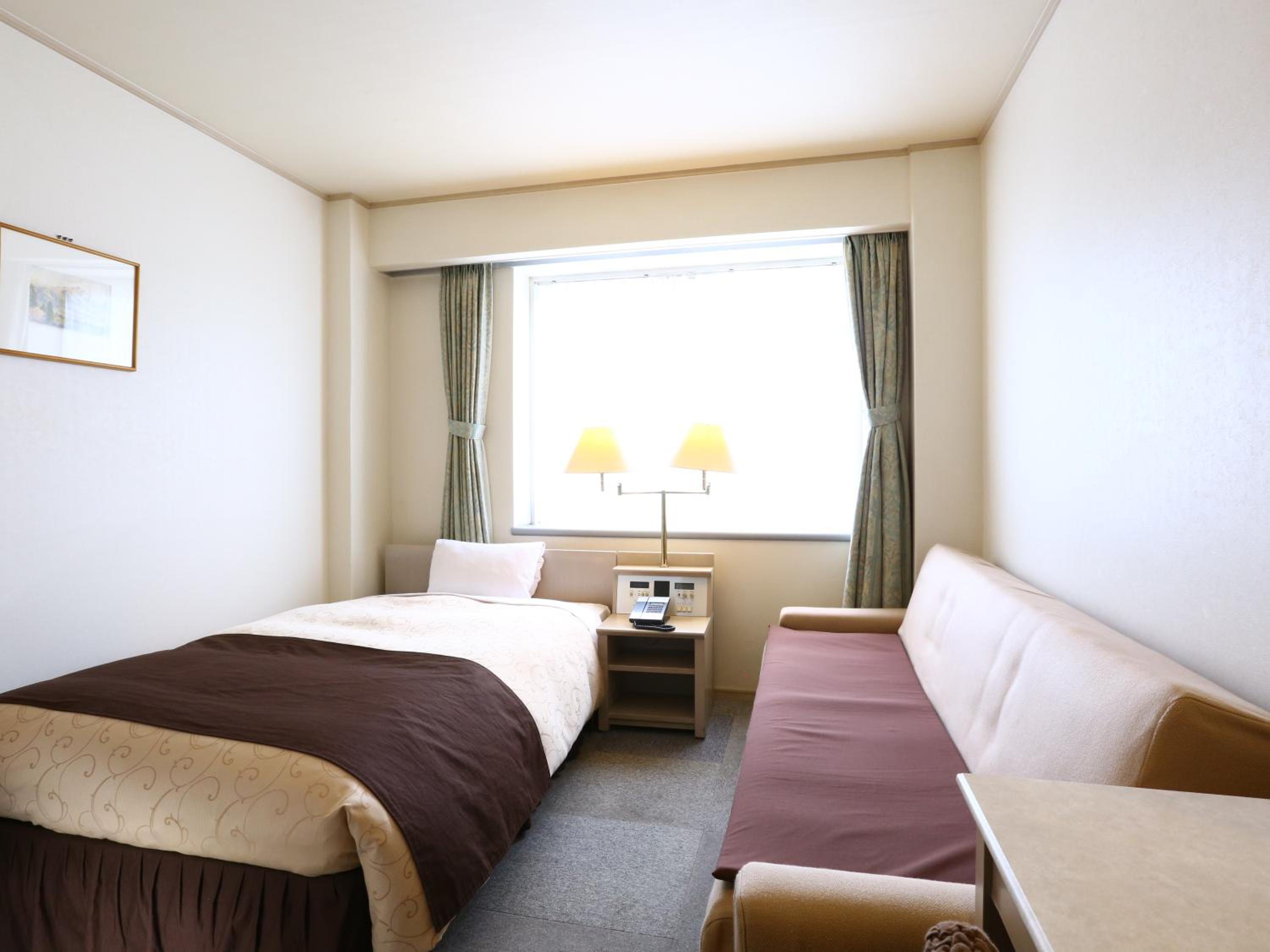 Single Room with Sofa Bed - Smoking photo 1