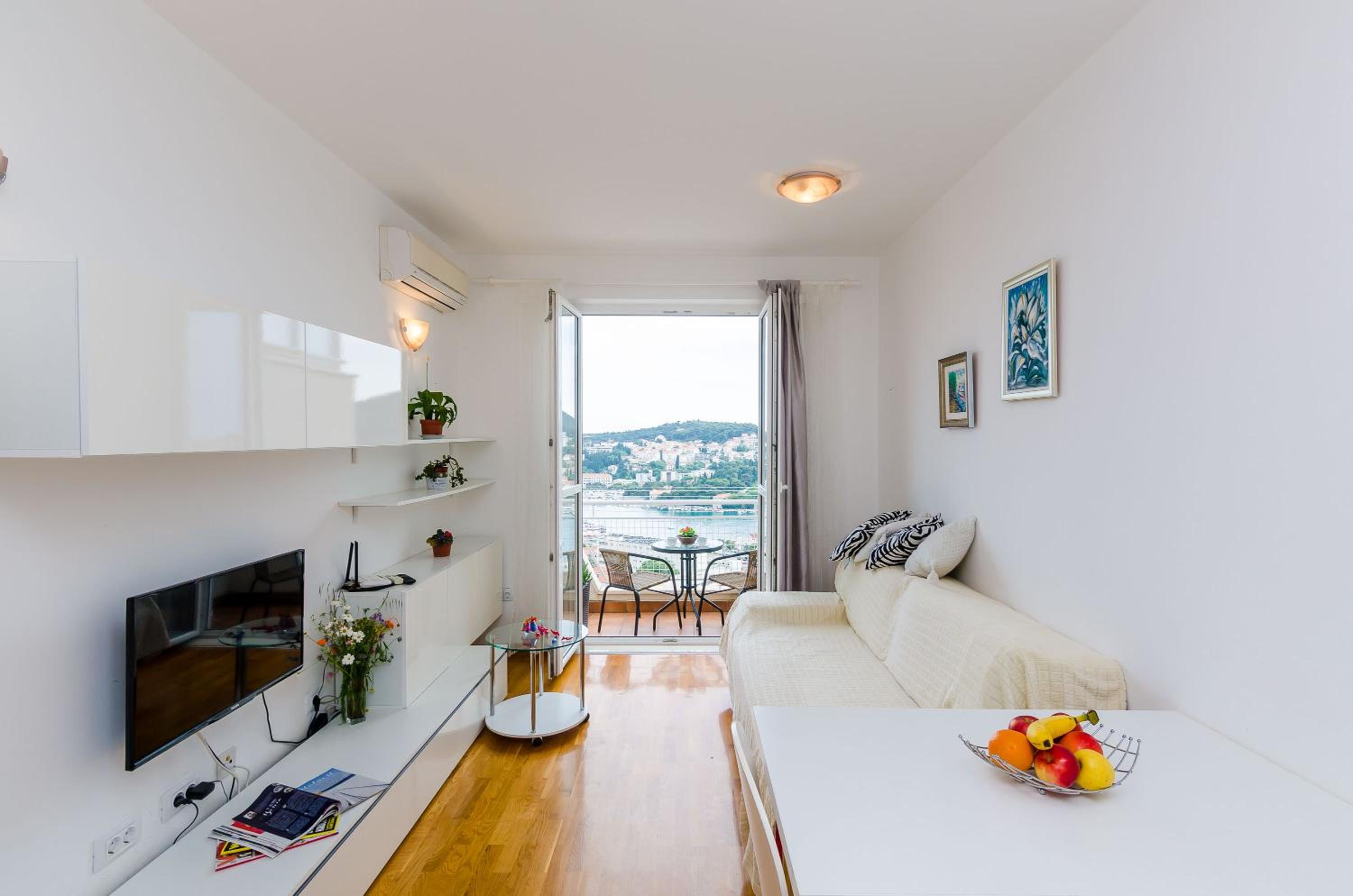 One-Bedroom Apartment with Balcony and Sea View