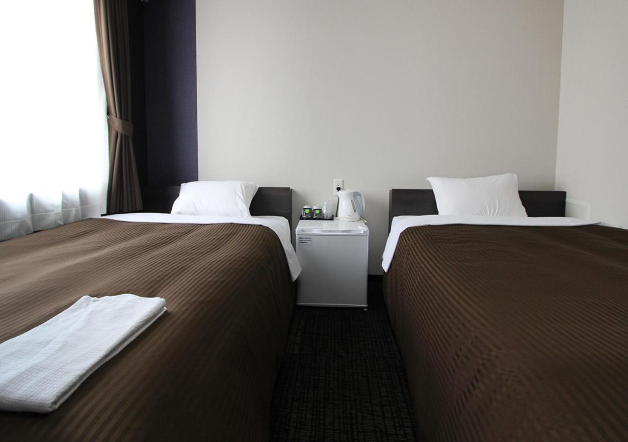 Twin Room - Non-Smoking - Photo 10