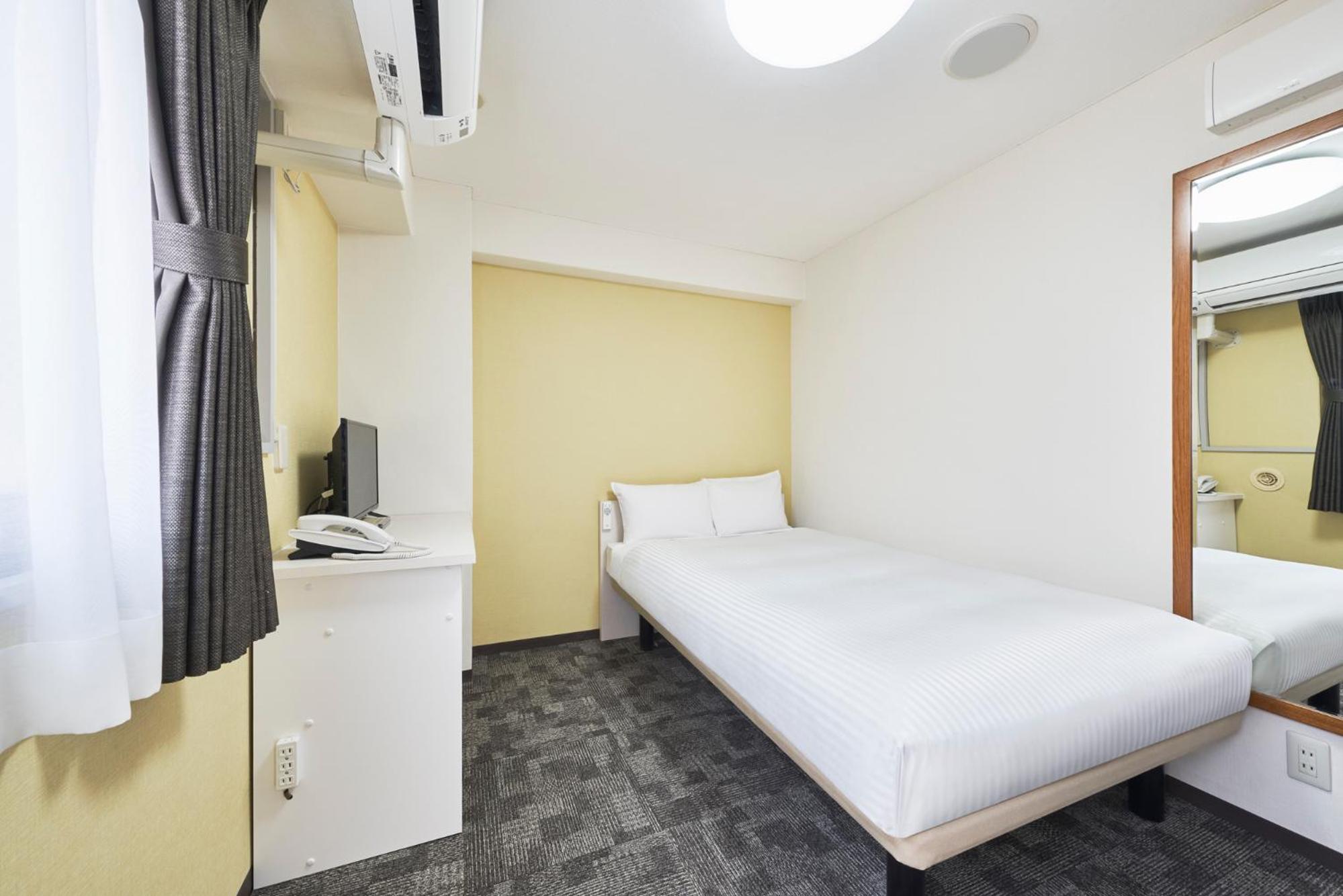 Standard Double Room with Small Double Bed without Kitchenette - Non-Smoking - House Keeping is Optional with Additional Cost photo 2