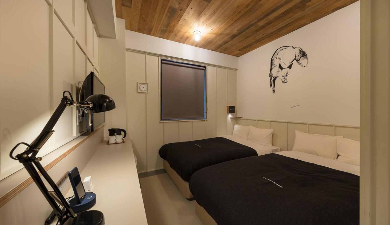 Compact Quadruple Room - 2 Small Double Beds photo 2