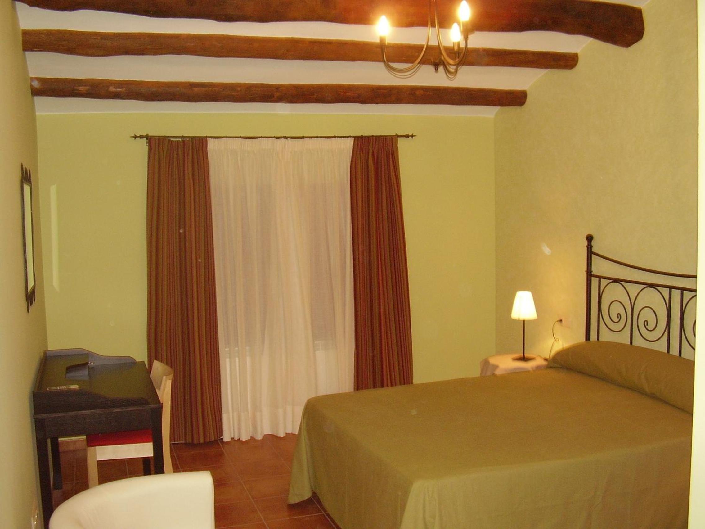 Suite King con Balcón