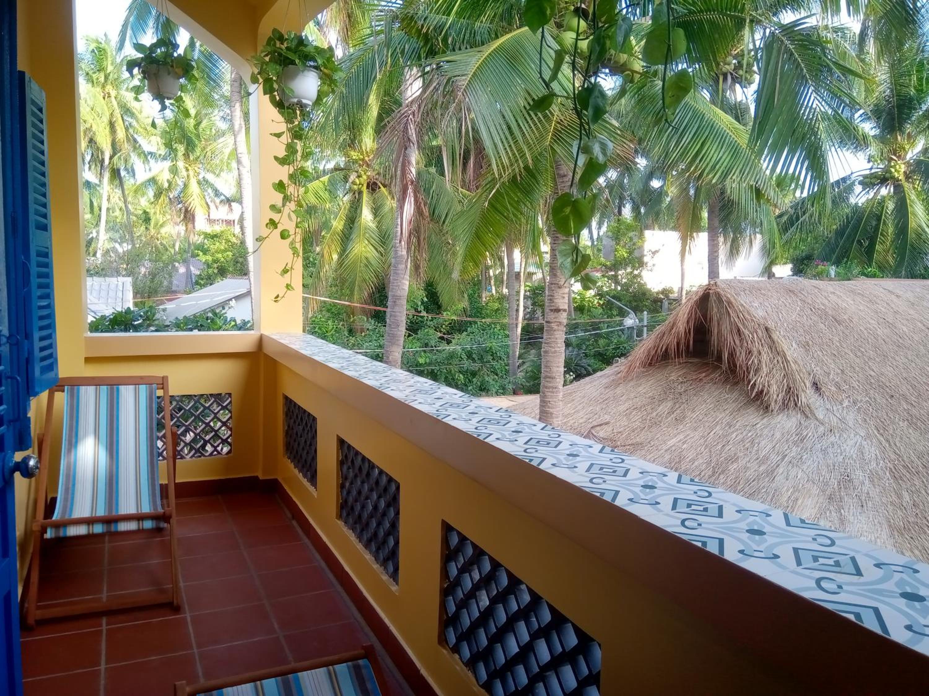 Deluxe Quadruple Room with Balcony - Top Floor photo 2