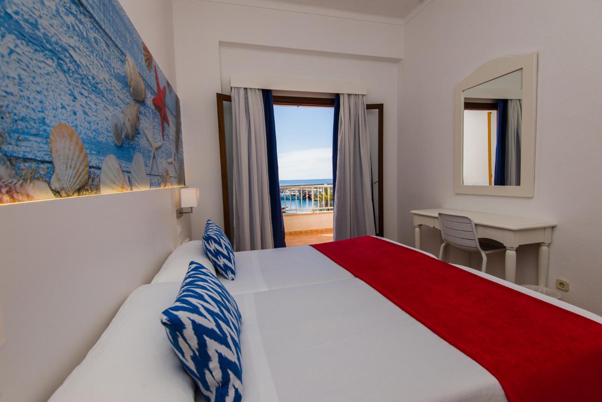 Habitación Doble con Balcón y Vista al Mar con aire acondicionado