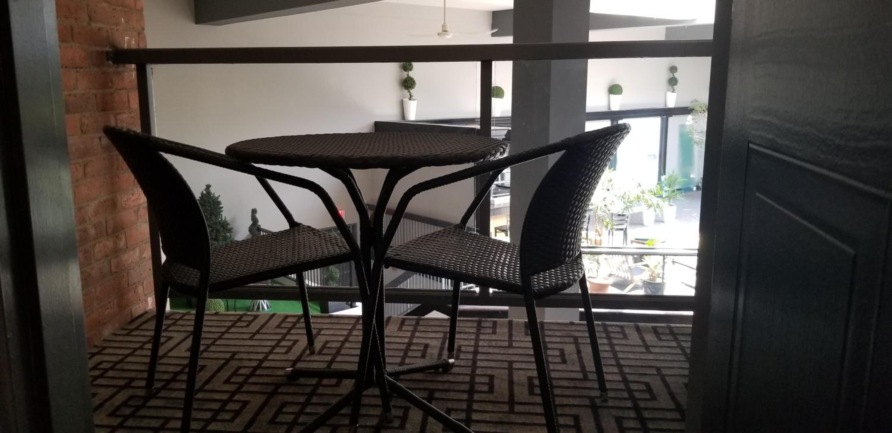 King Suite with Balcony - Non-Smoking thumbnail 5
