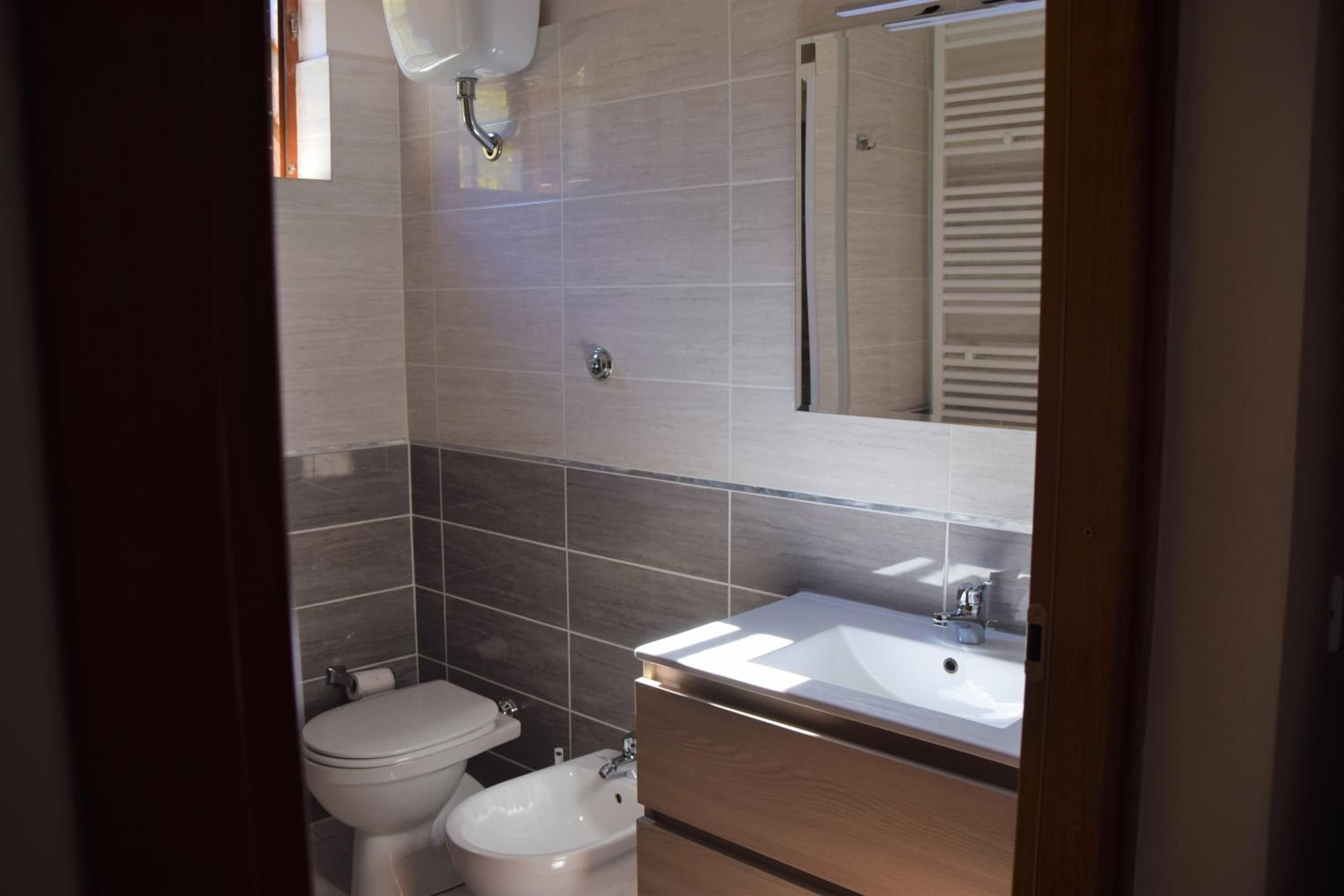 Three-Bedroom Apartment - Photo 37