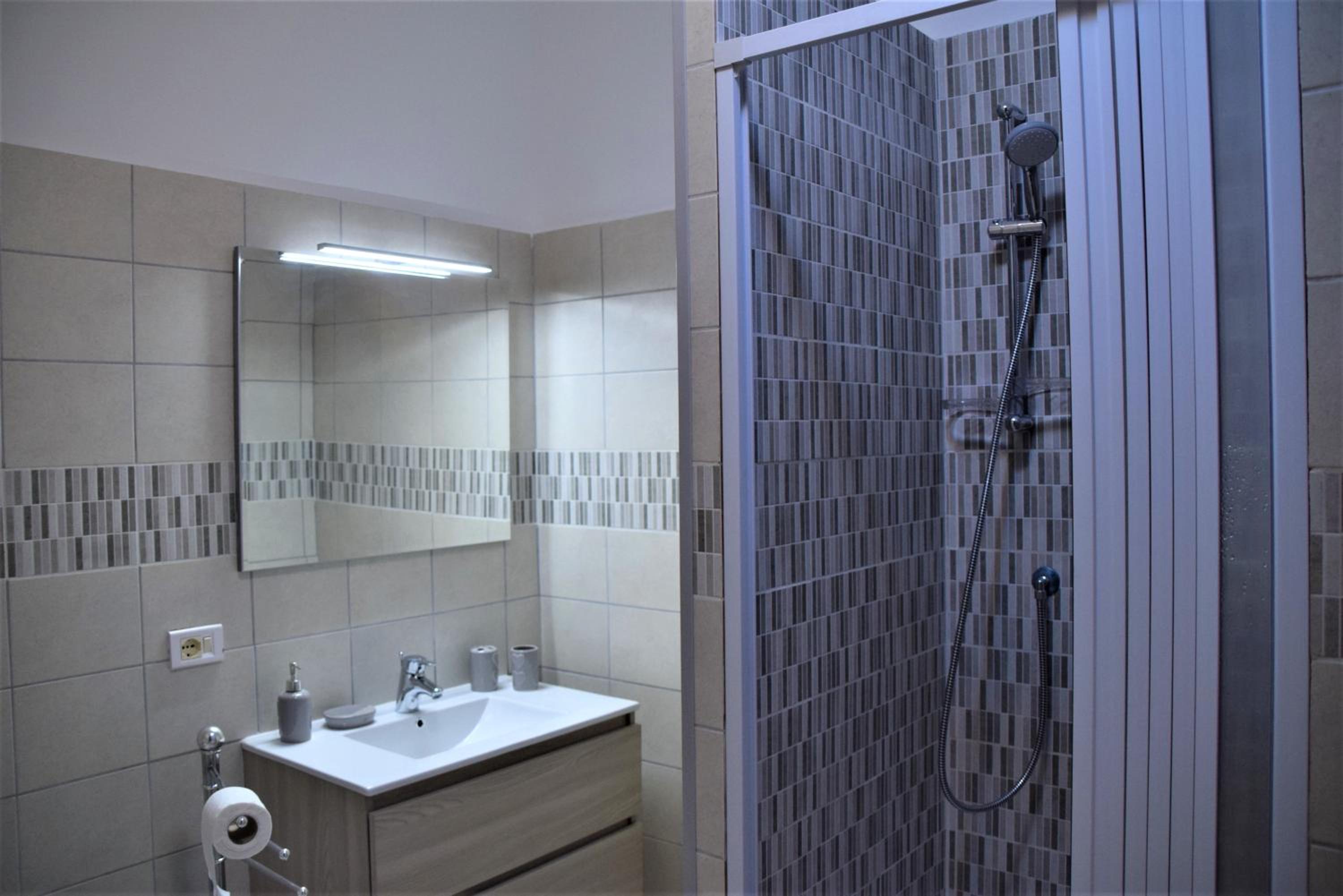 Three-Bedroom Apartment - Photo 11