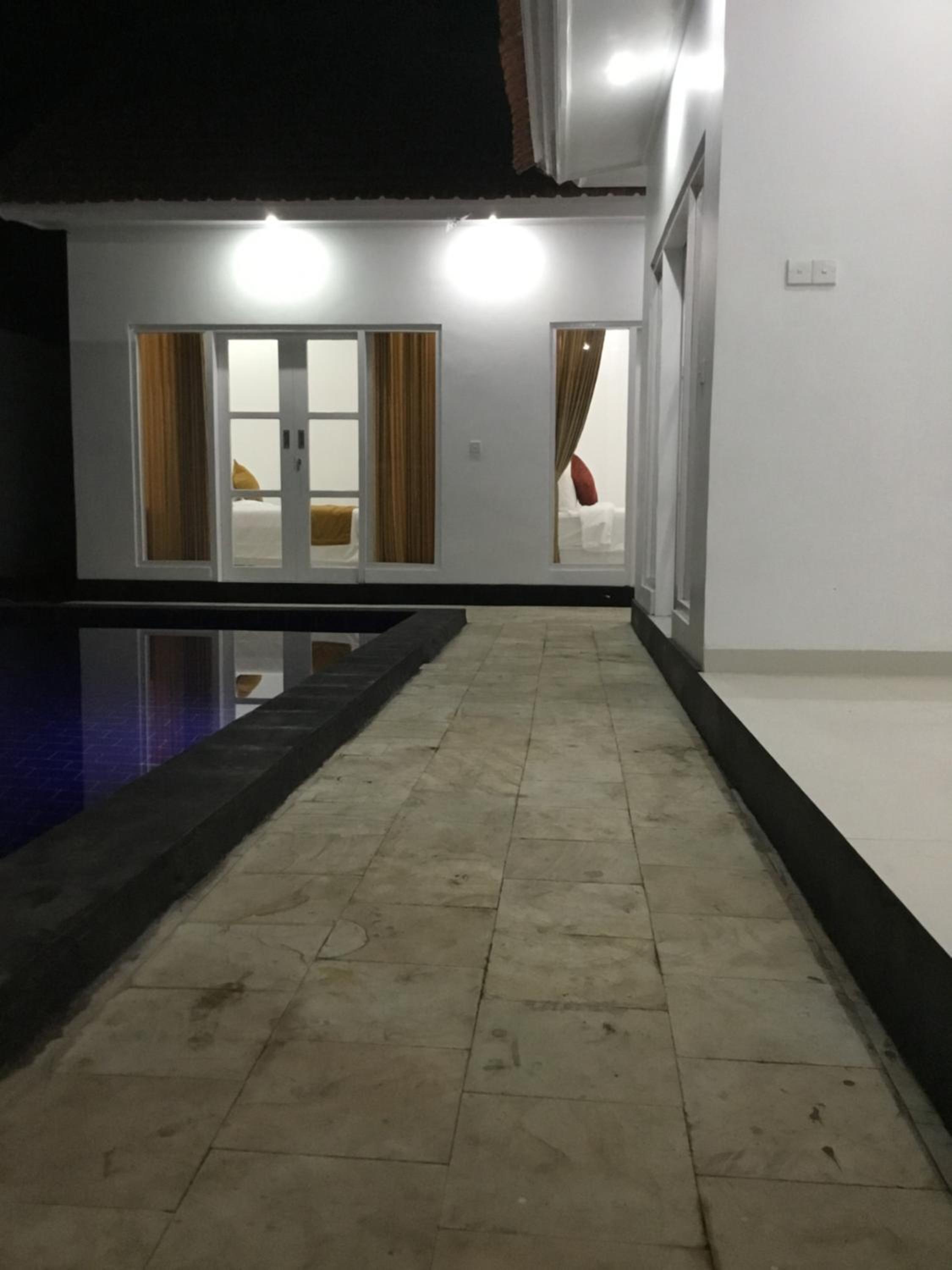 Deluxe Room (2 Adults + 1 Child) - Photo 7
