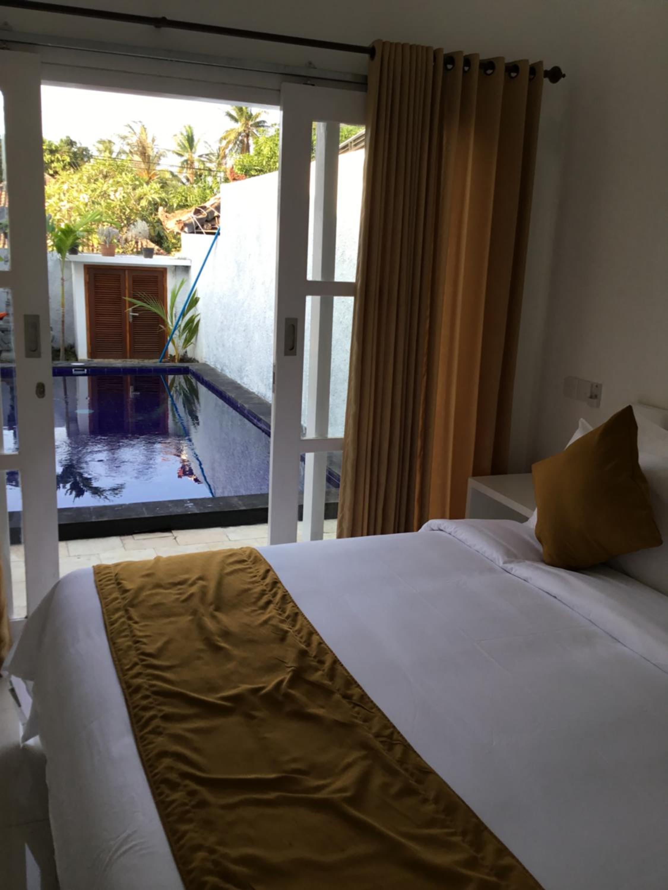 Deluxe Room (2 Adults + 1 Child) - Photo 3