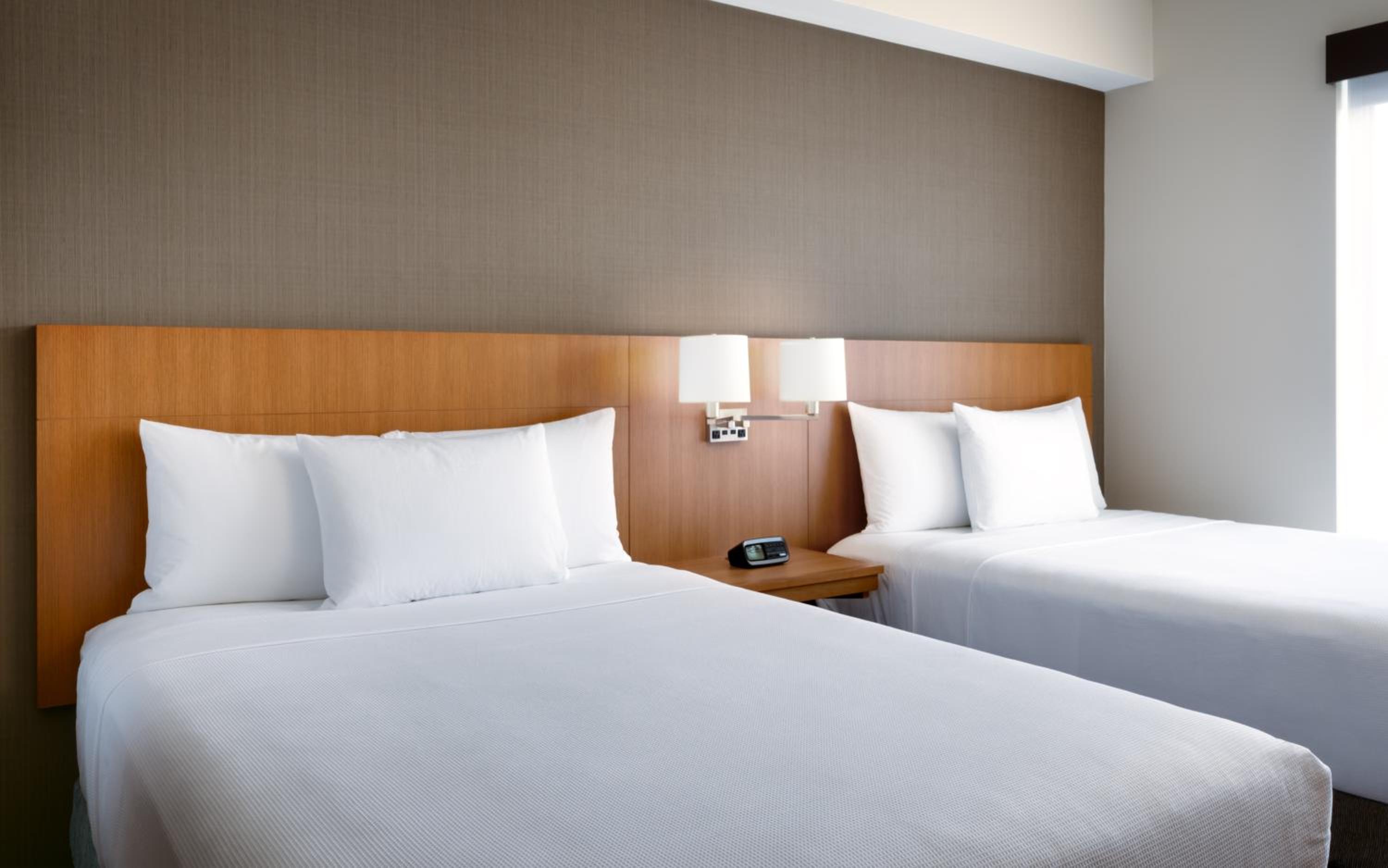Queen Room with Two Queen Beds with Sofa Bed and Tub - Disability Access photo 1