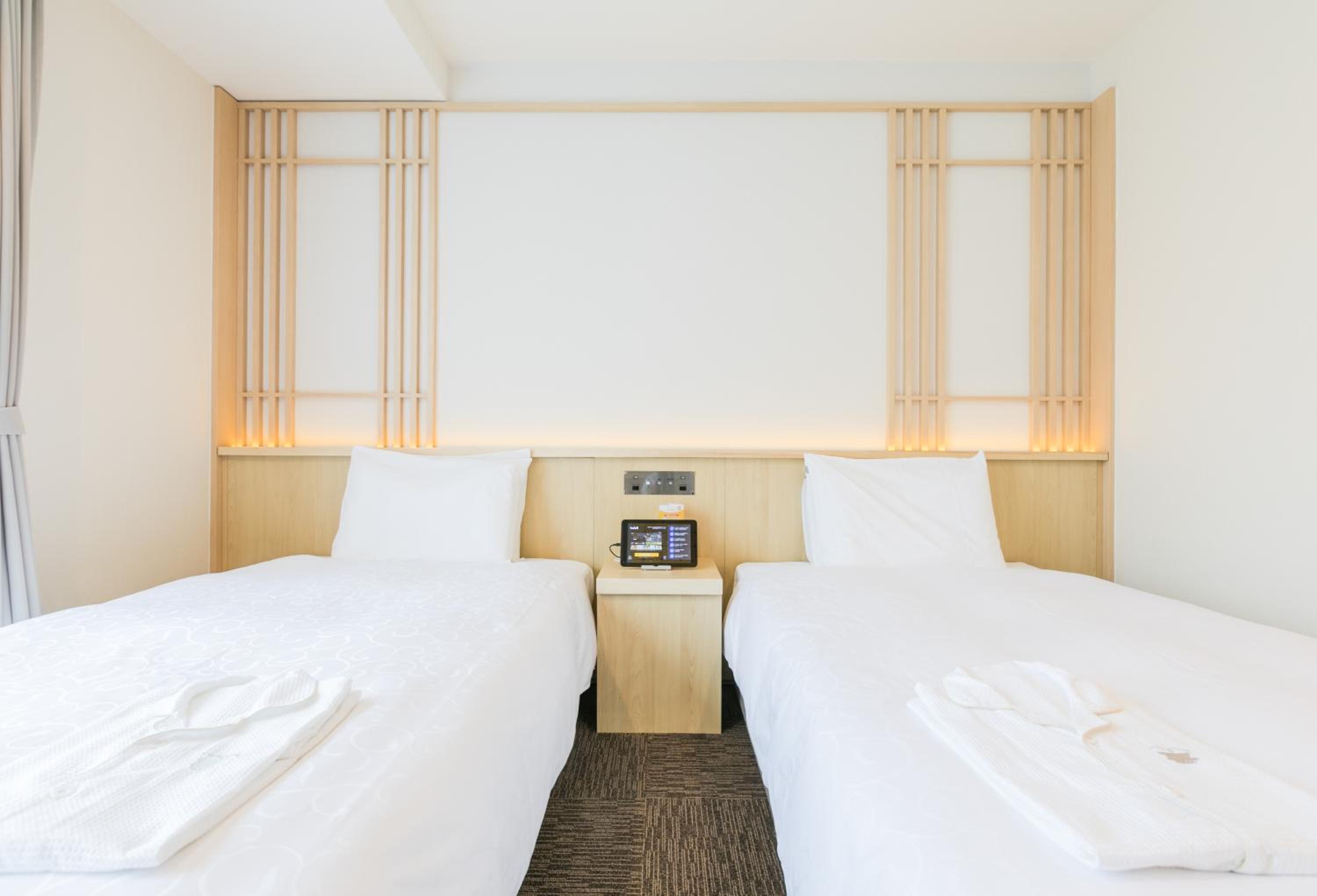 Phiten Twin Room - Photo 7