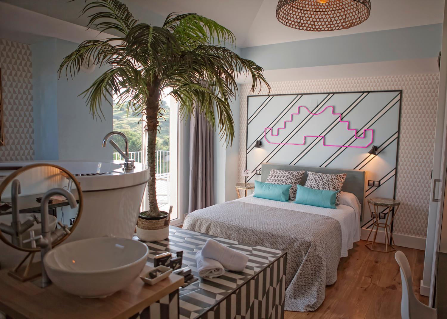 Habitación Doble Deluxe con Bañera de Hidromasaje y Balcón con Vista al Mar.