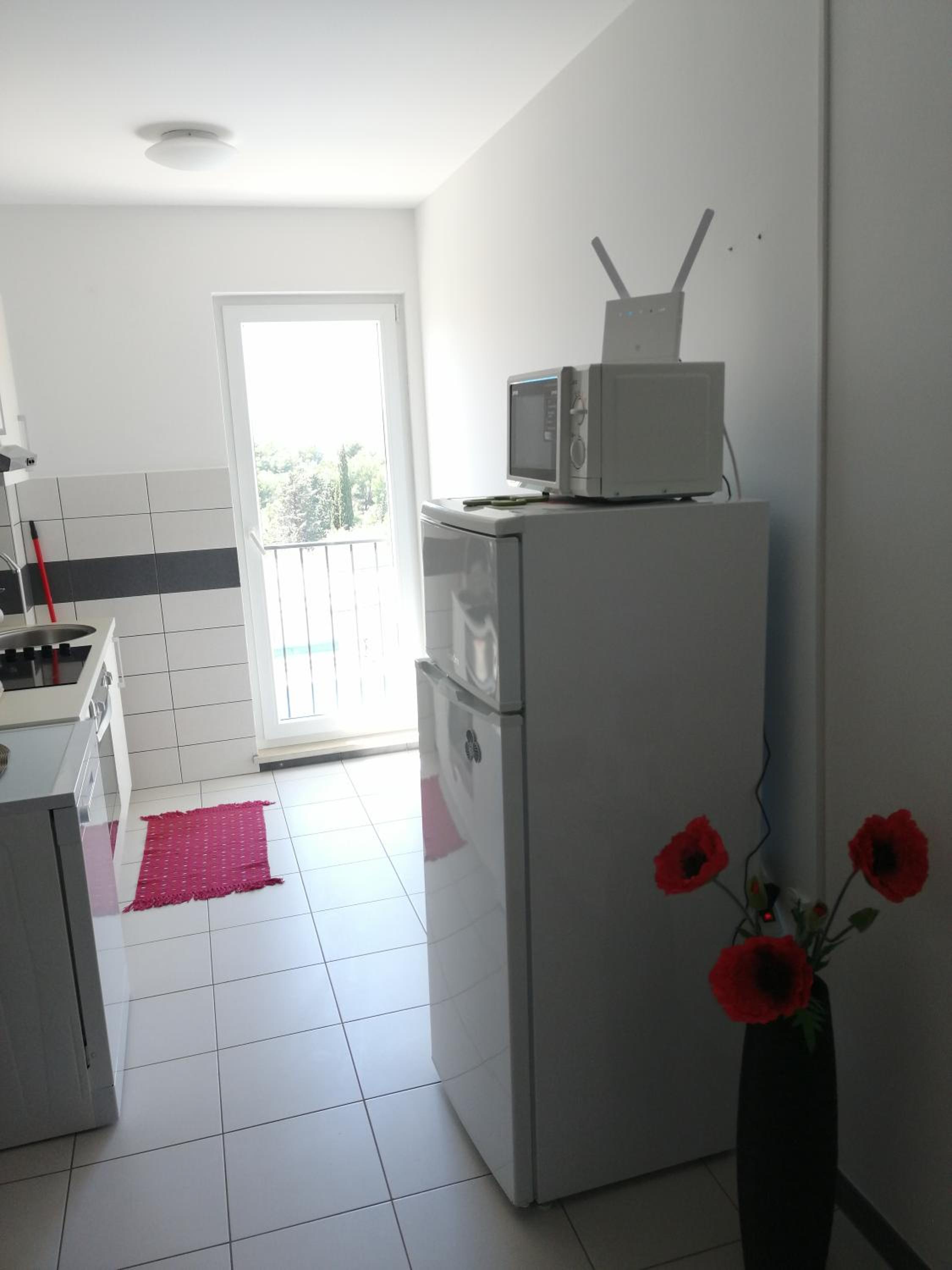 Comfort Two-Bedroom Apartment with Balcony and Sea View - Photo 18