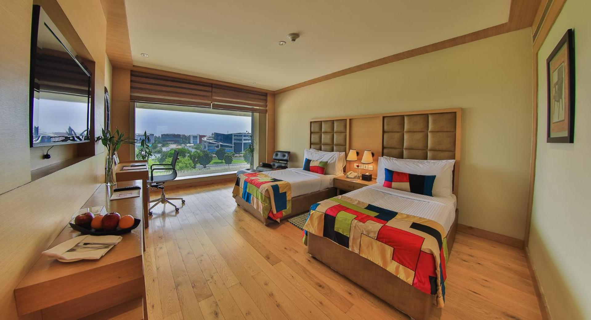 Deluxe Twin Room with 10% discount on F&SB, SPA & Laundry,Happy Hours deal offering 1+1 offer. Offer is available from 6:00 PM till 8:00 PM at The Circle Bar Deluxe Twin Room with 10% discount on F&SB, SPA & Laundry,Happy Hours deal offering 1+1 offer. Offer is available from 6:00 PM till 8:00 PM at The Circle Bar
