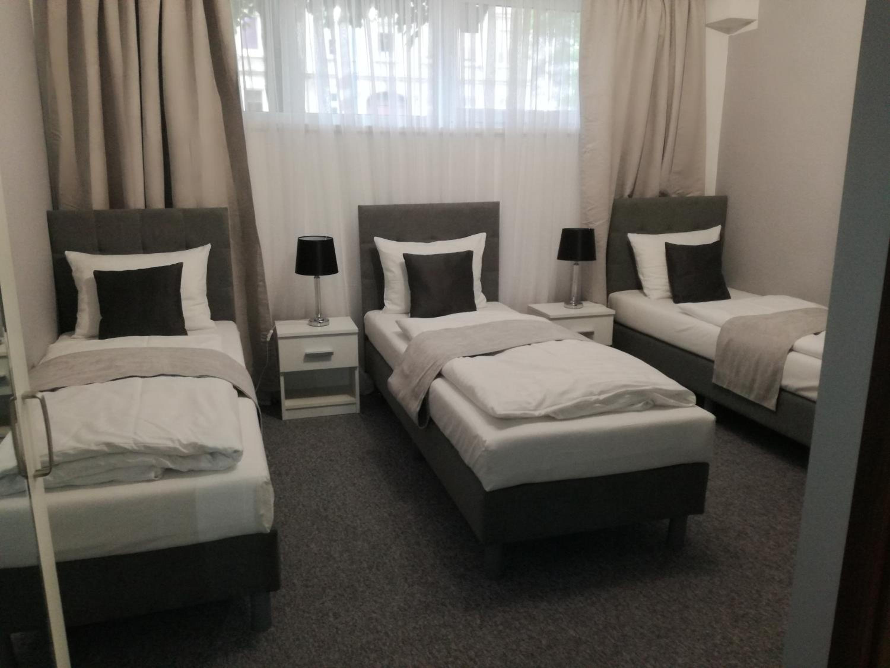 Classic Triple Room - Photo 1