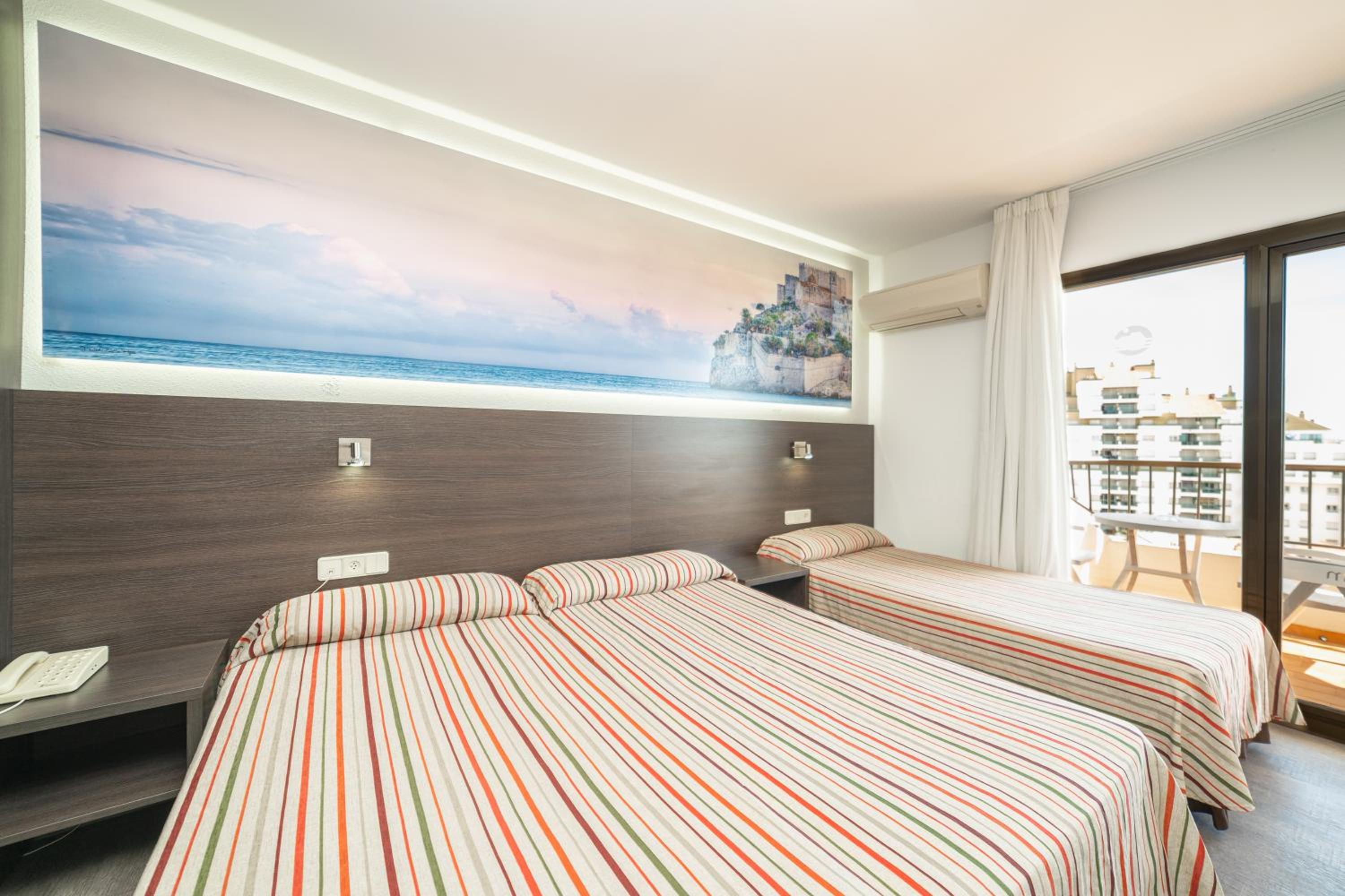 Quadruple Room (2 Adults + 2 Children) photo 3