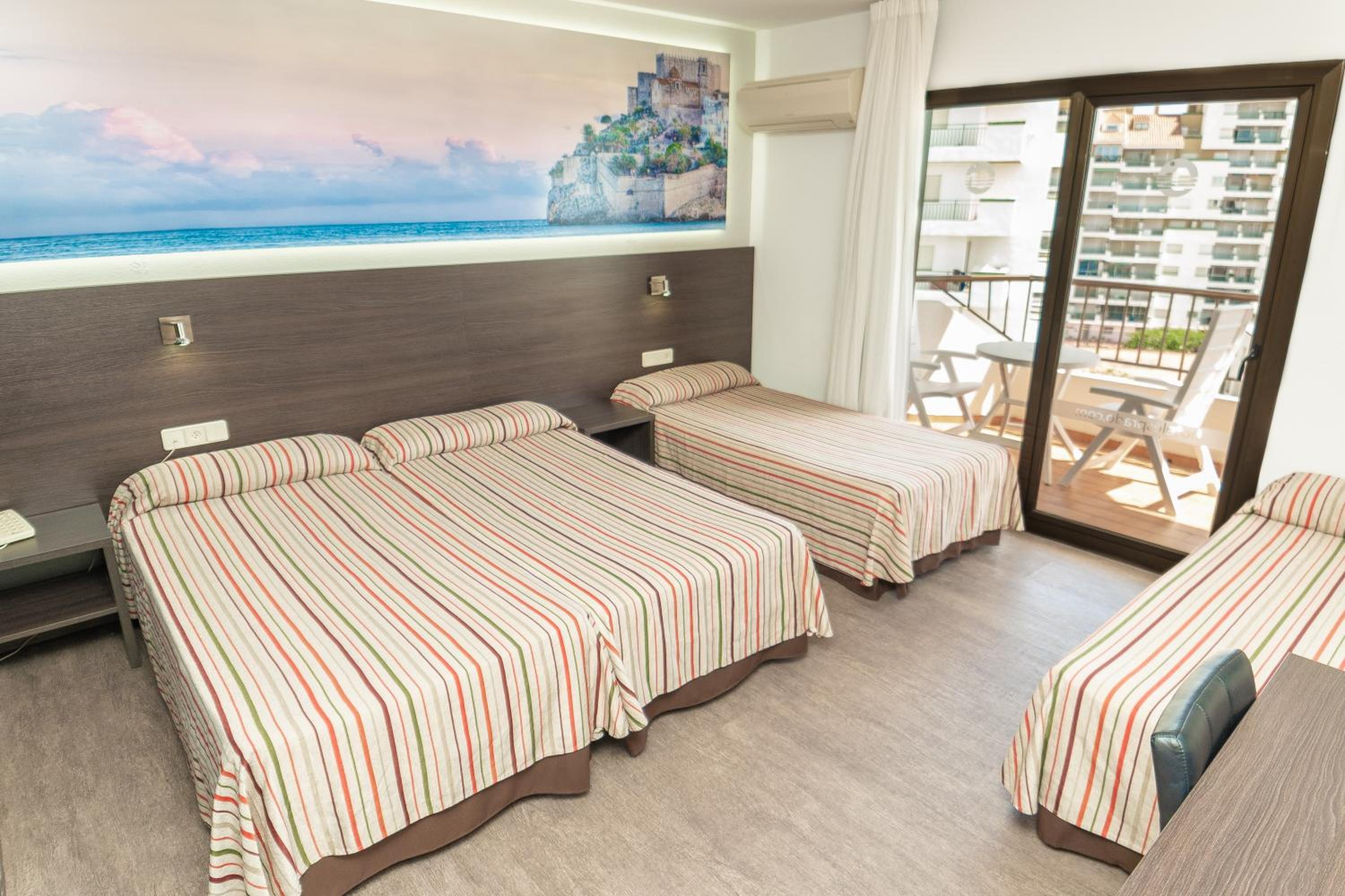 Quadruple Room (3 Adults + 1 Child) photo 1