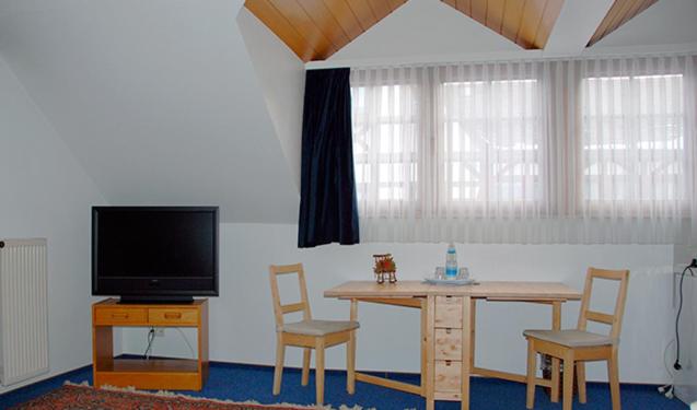 Family Room with Balcony - Photo 1