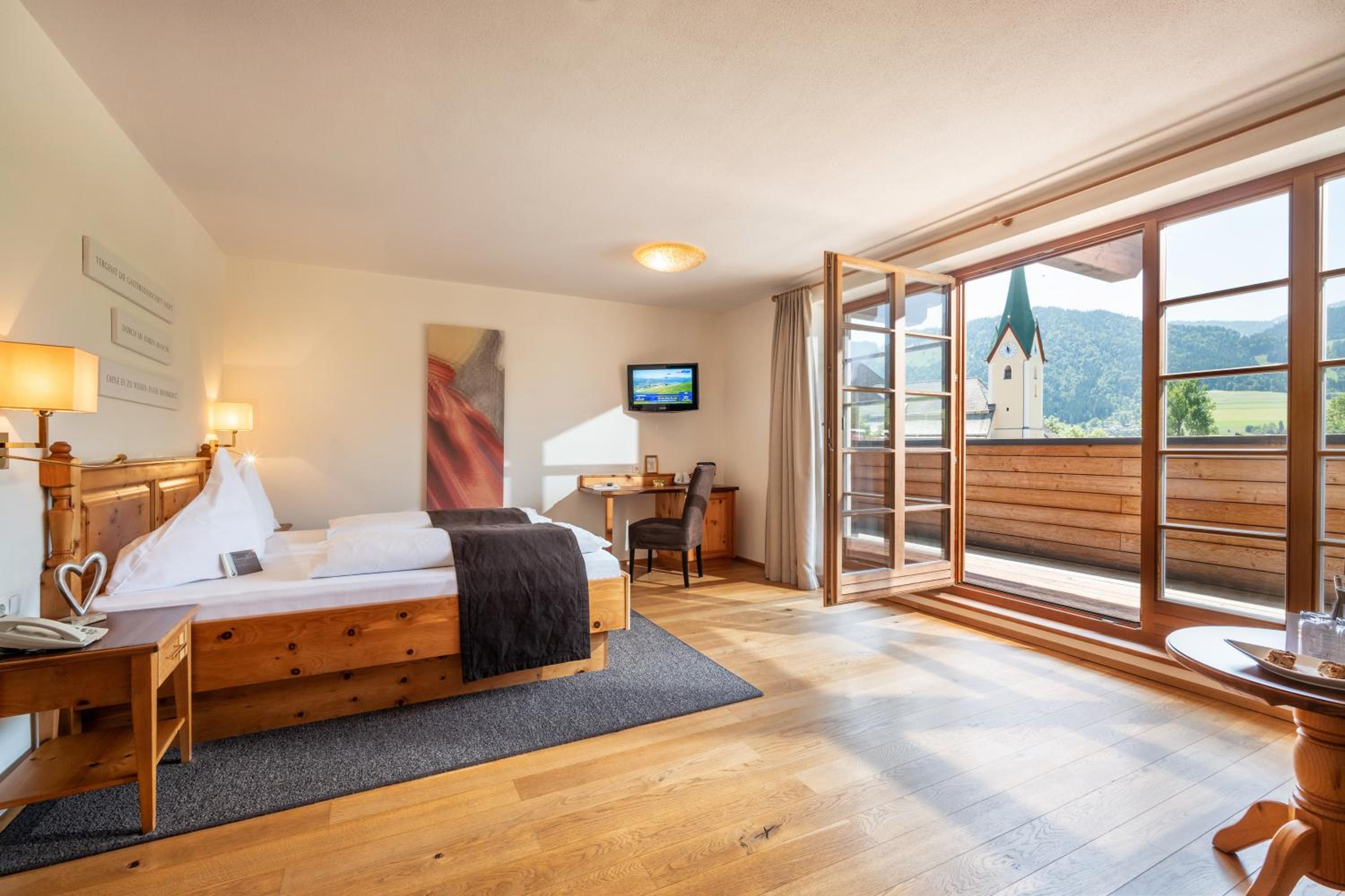 Deluxe Double Room with Balcony and Garden View