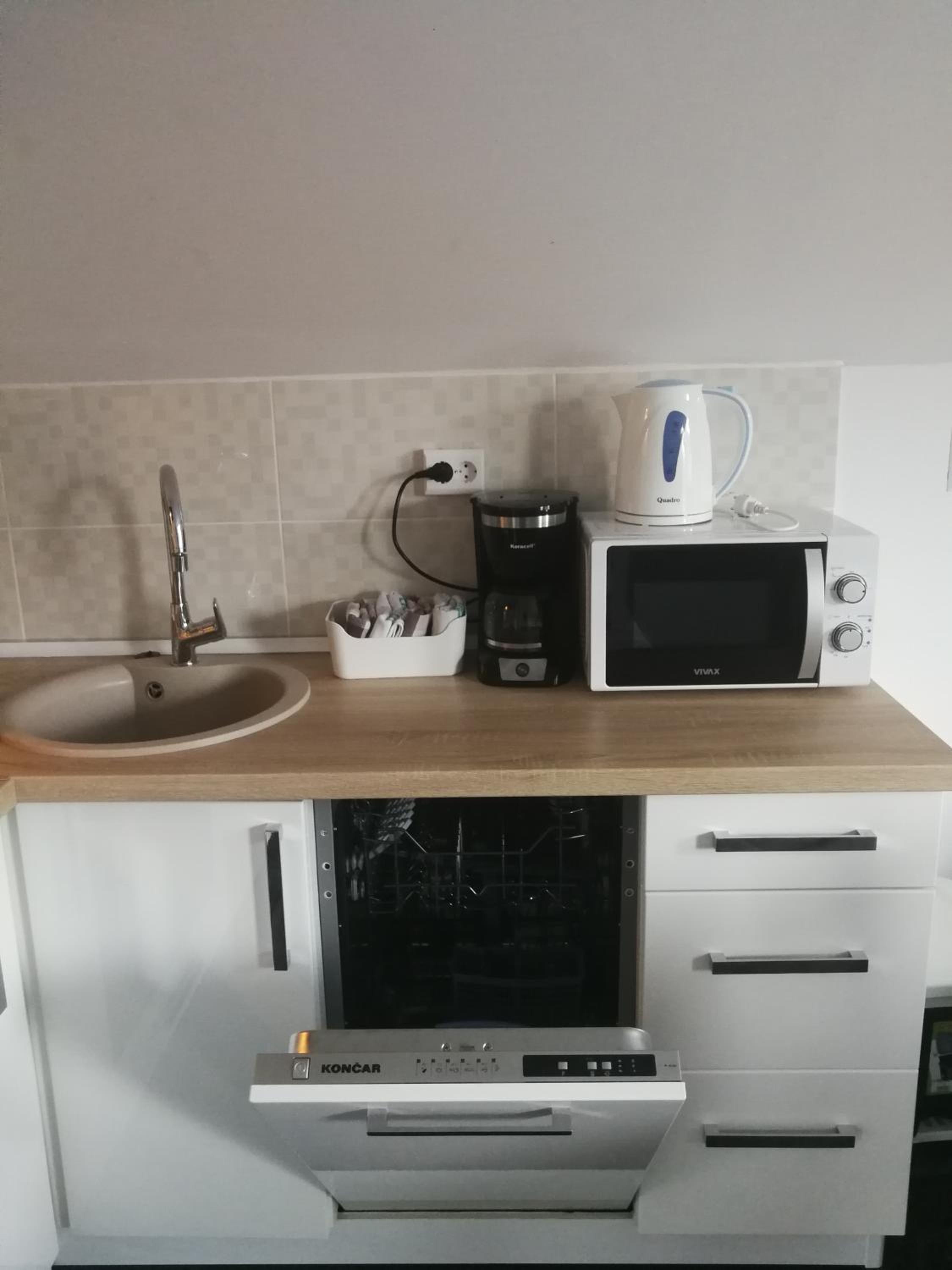 Three-Bedroom Apartment - Photo 31