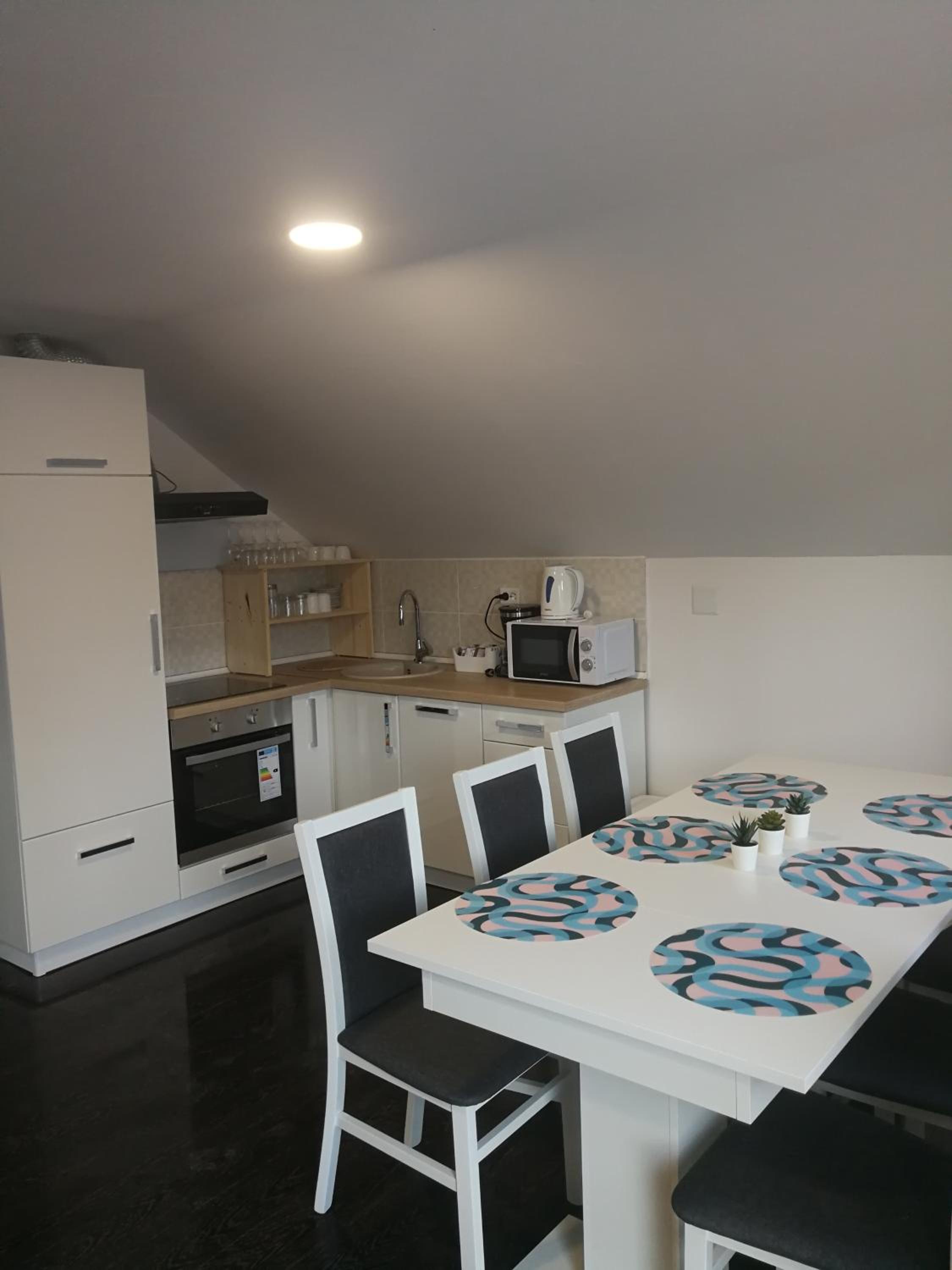 Three-Bedroom Apartment - Photo 32