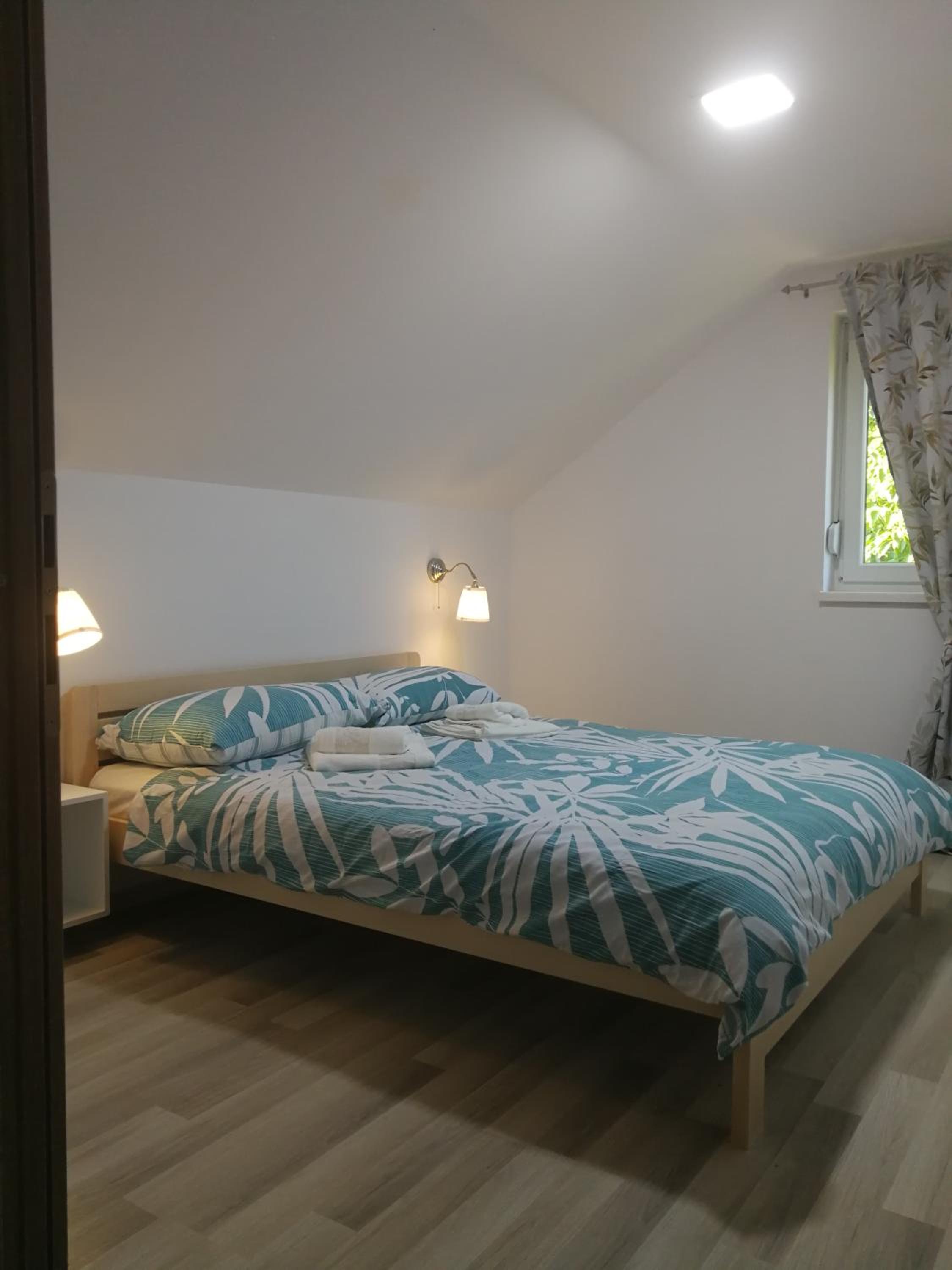 Three-Bedroom Apartment - Photo 41