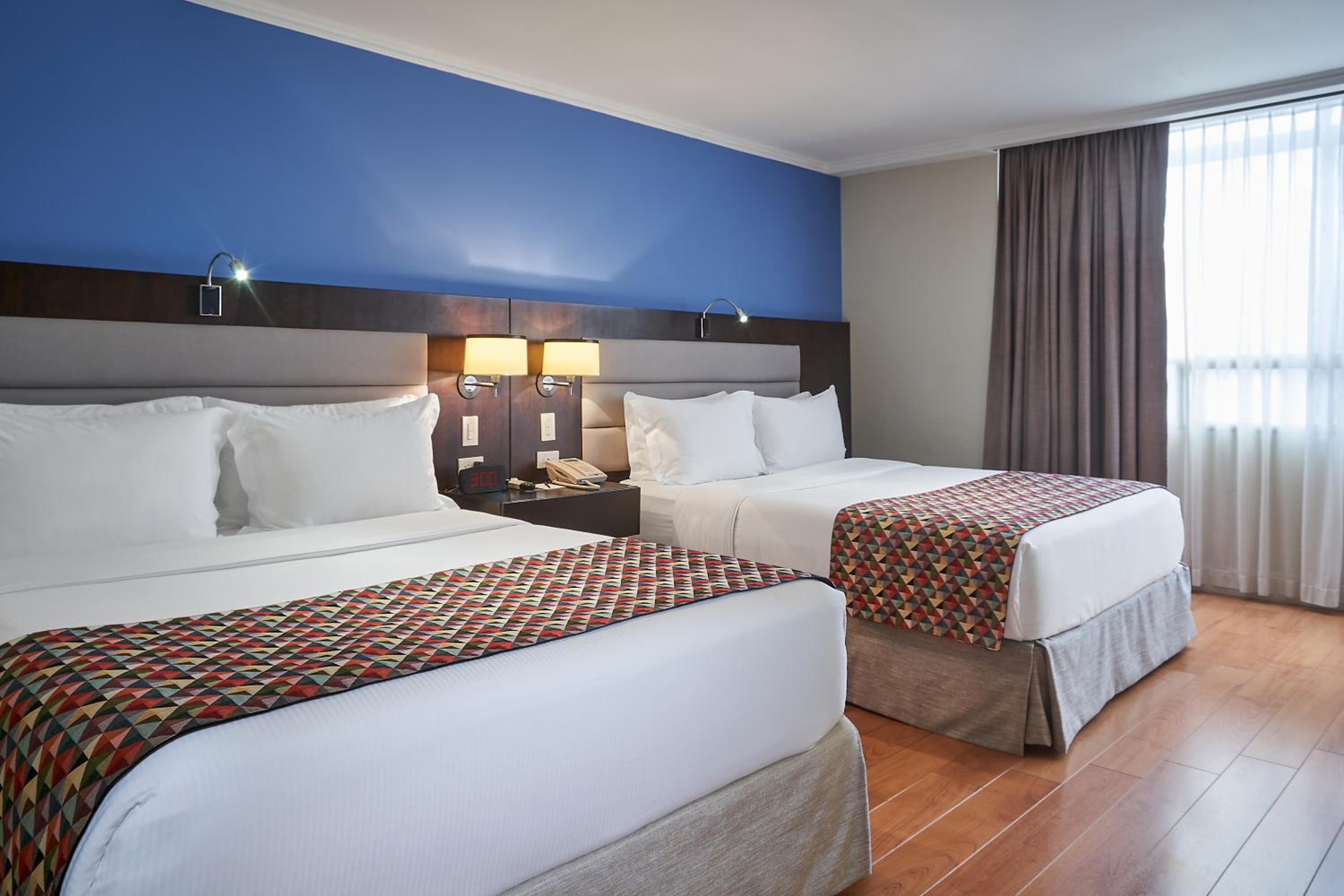 Executive Suite with Two Queen Beds and Sofa - Photo 1