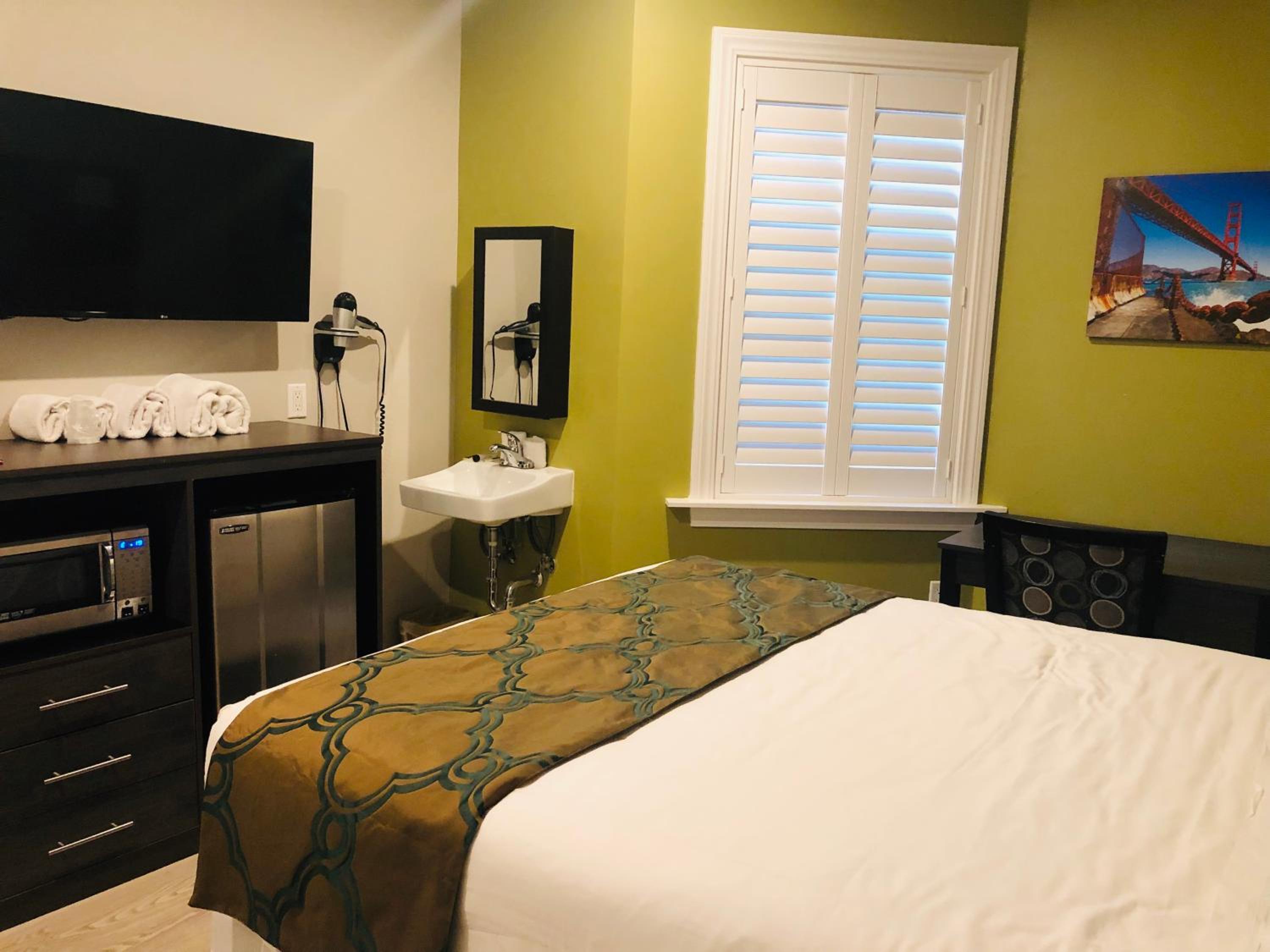 Queen Room with Shared Bathroom