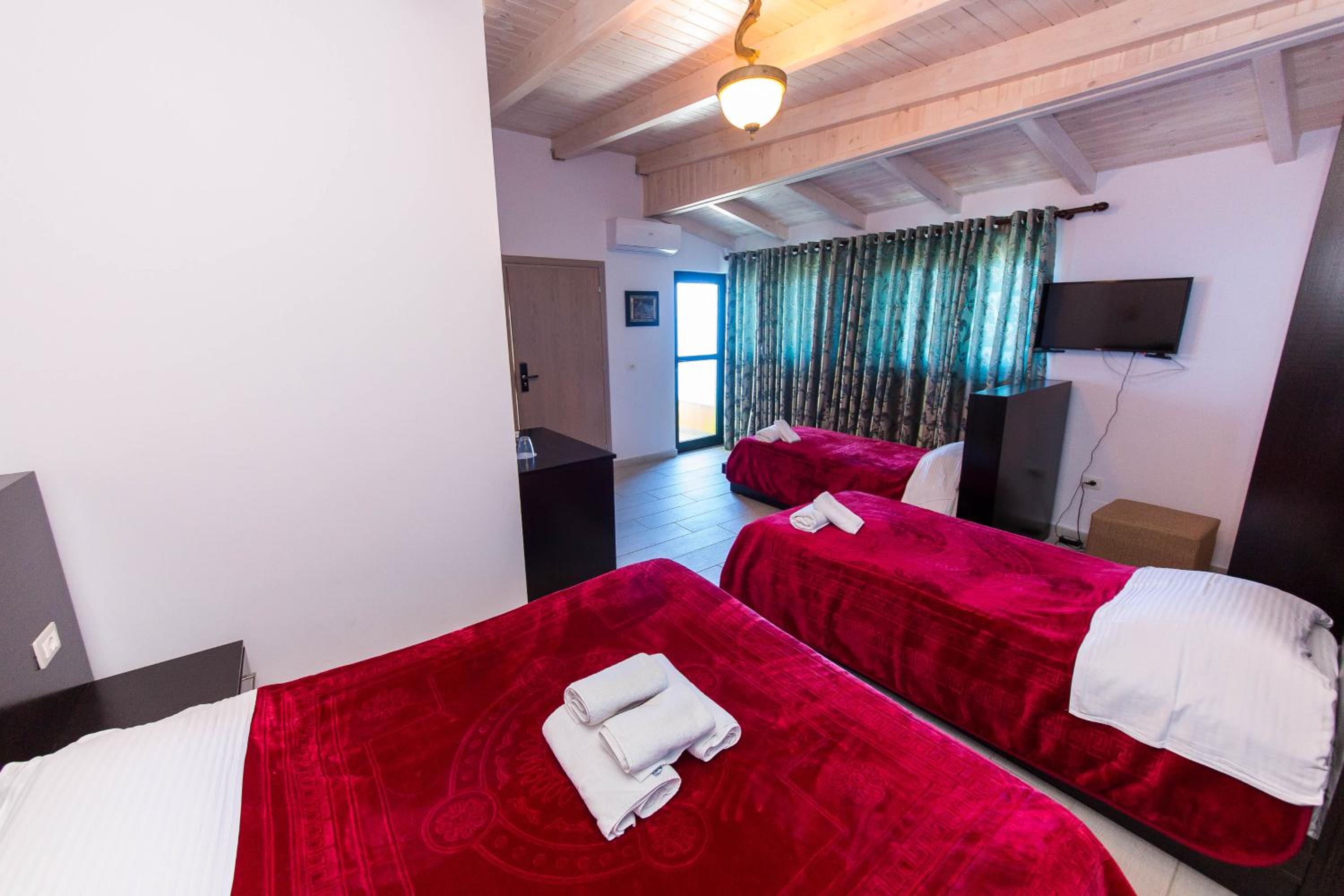 Superior Quadruple Room with Balcony and Side Sea View photo 1