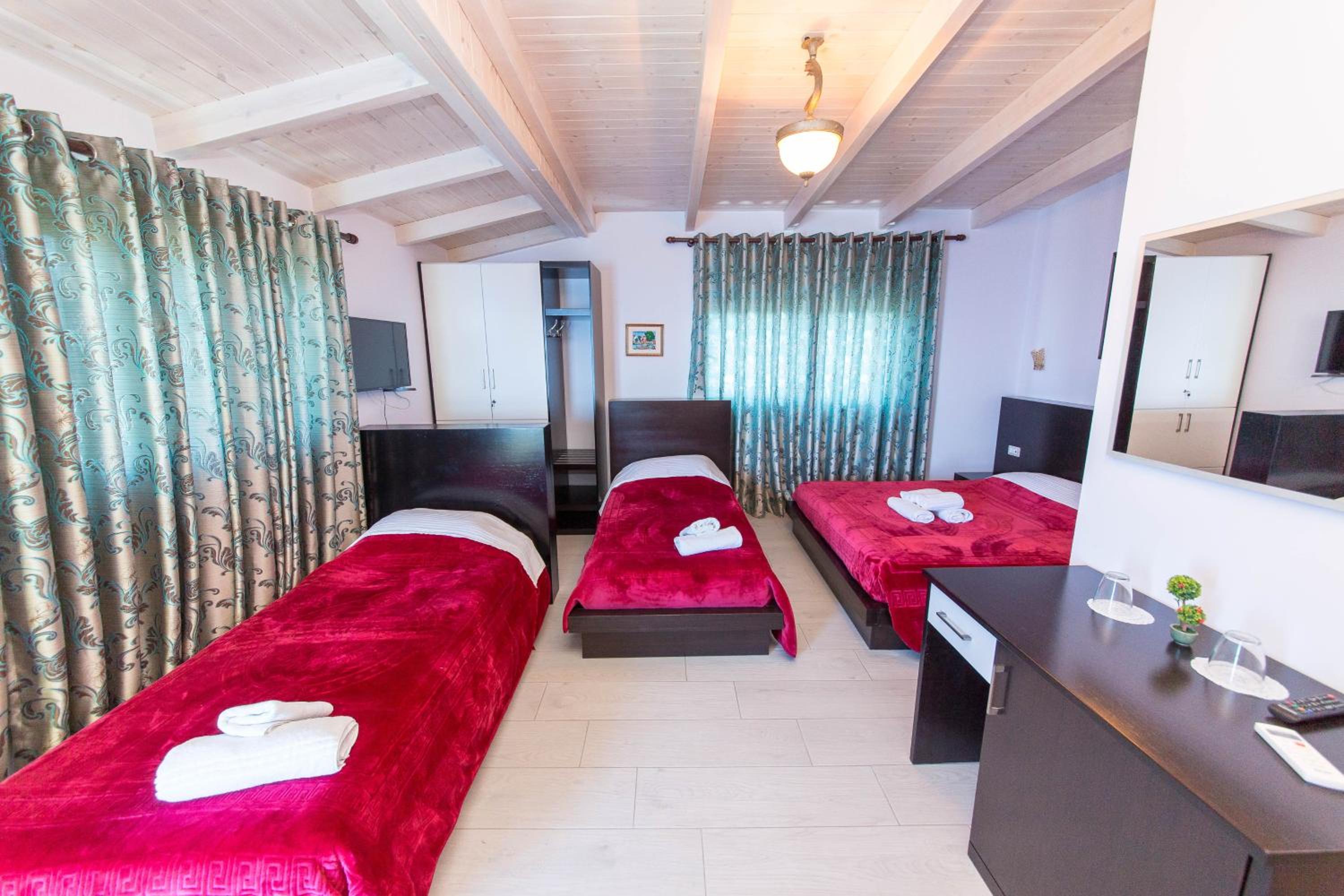 Superior Quadruple Room with Balcony and Side Sea View photo 2