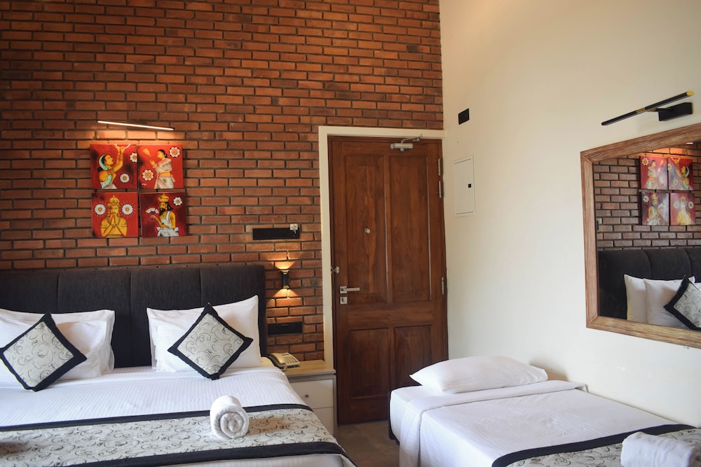 Deluxe Triple Room - Photo 1