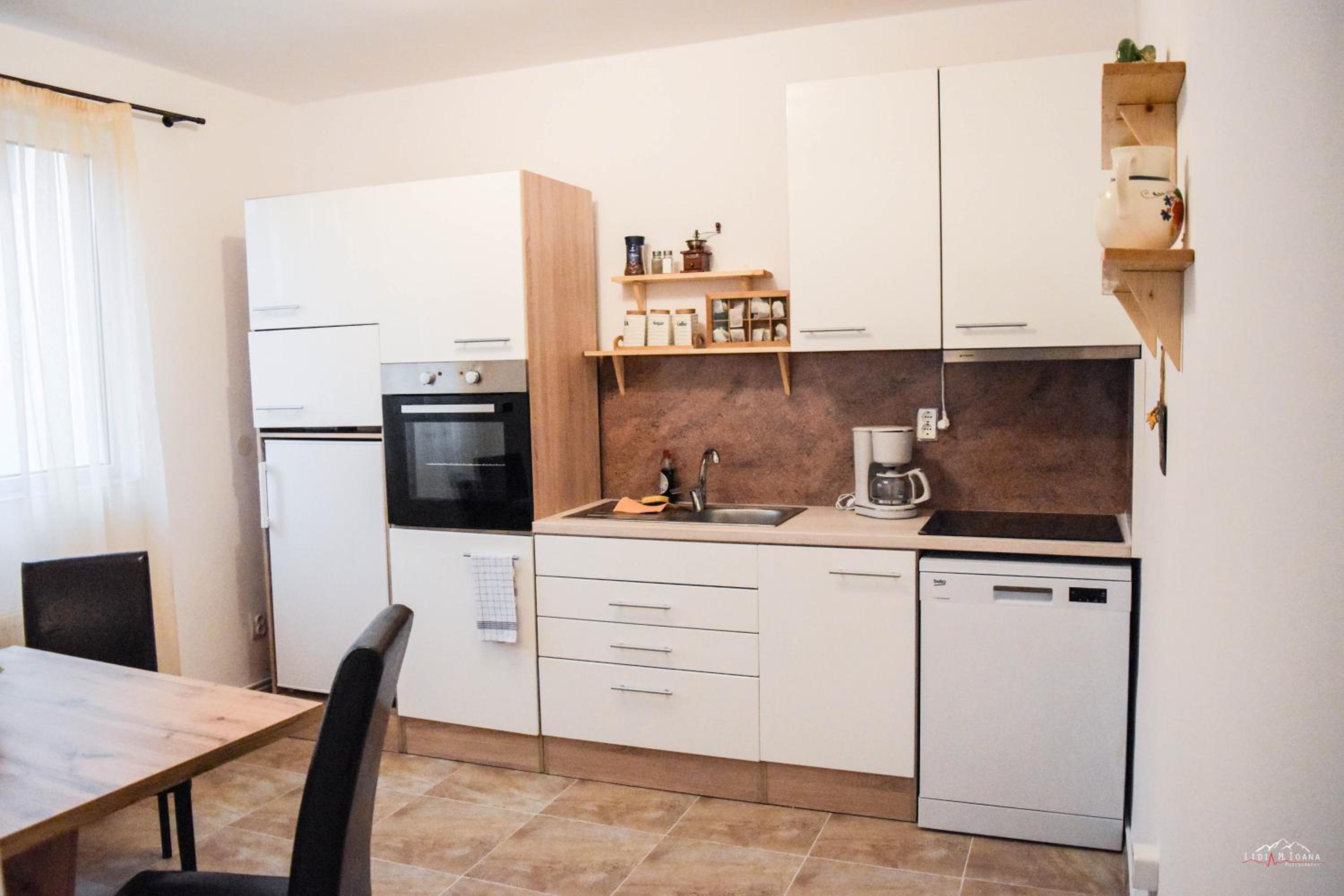 Three-Bedroom Apartment - Photo 12