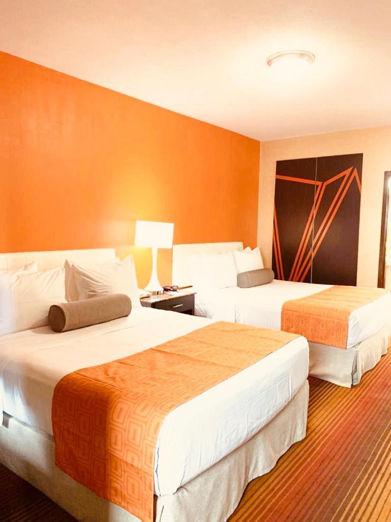 Queen Room with Two Queen Beds - Smoking photo 1
