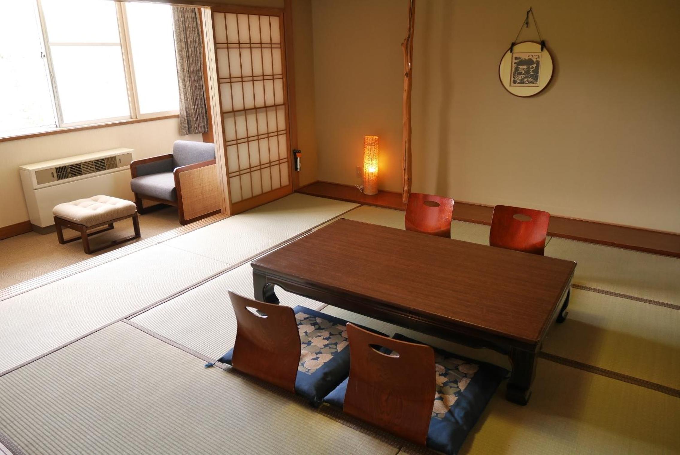 Deluxe Quadruple Room - Photo 7