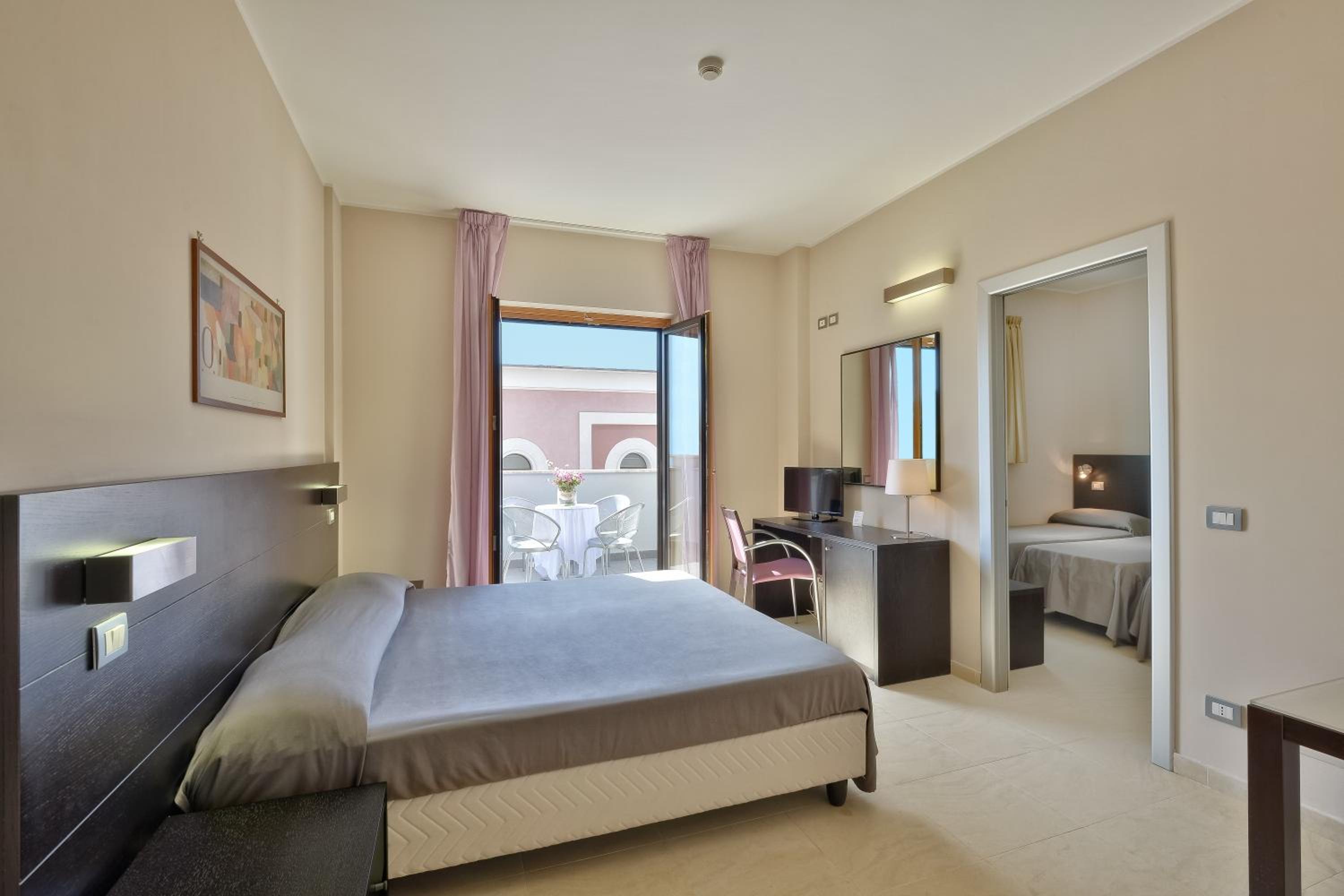 Quadruple Room - Photo 1