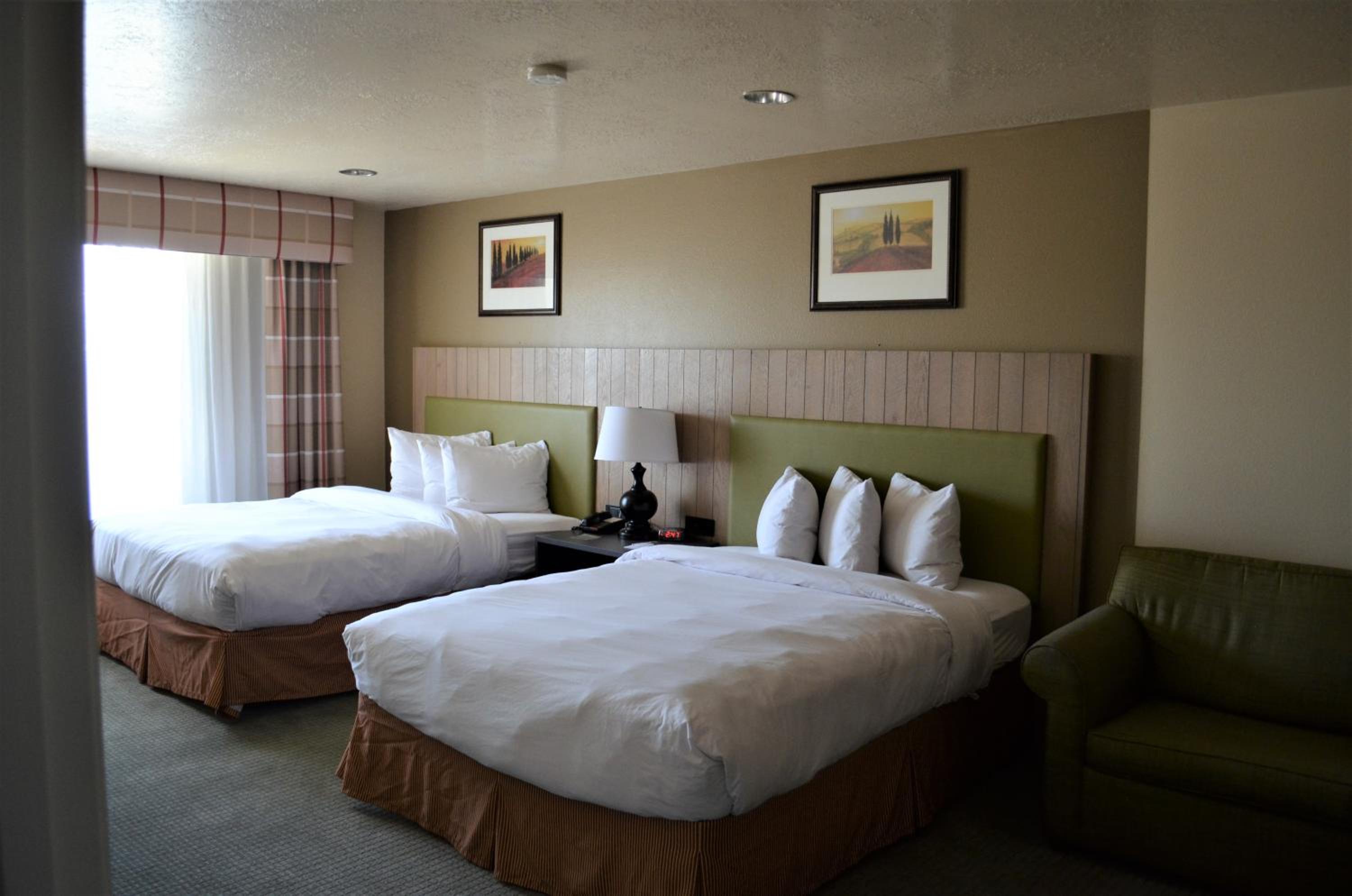 Queen Room with Two Queen Beds - Photo 1