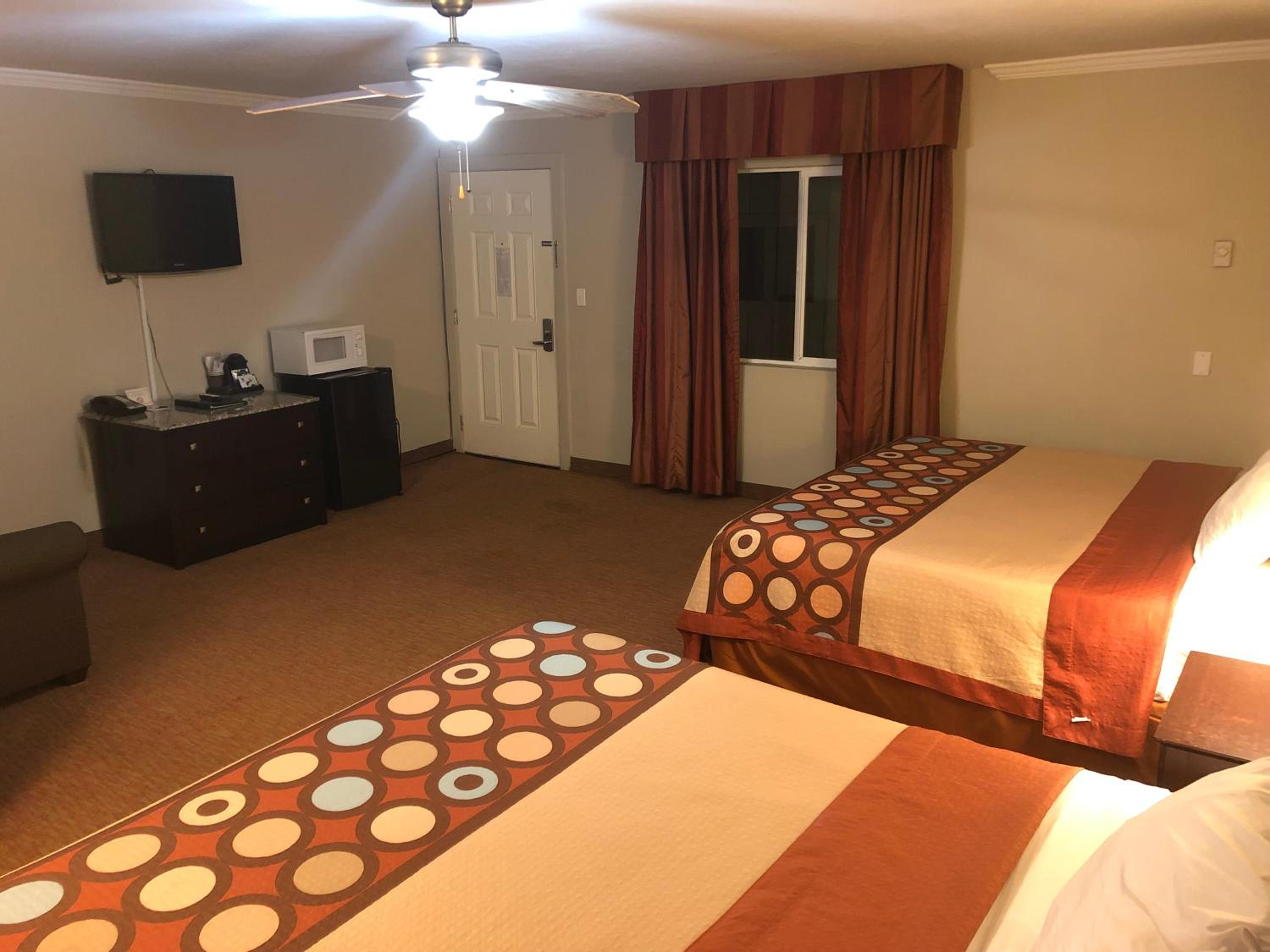 Deluxe Queen Suite with Two Queen Beds - Non-Smoking - Photo 1