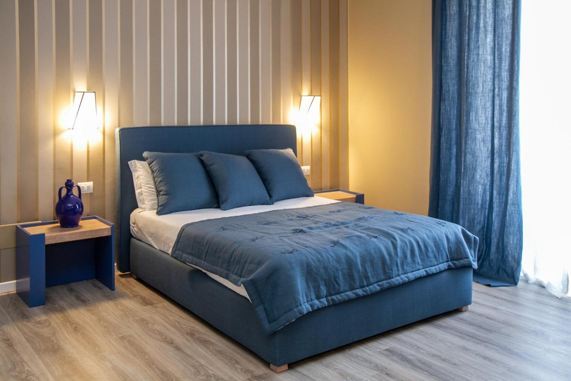Deluxe Quadruple Room - Photo 1