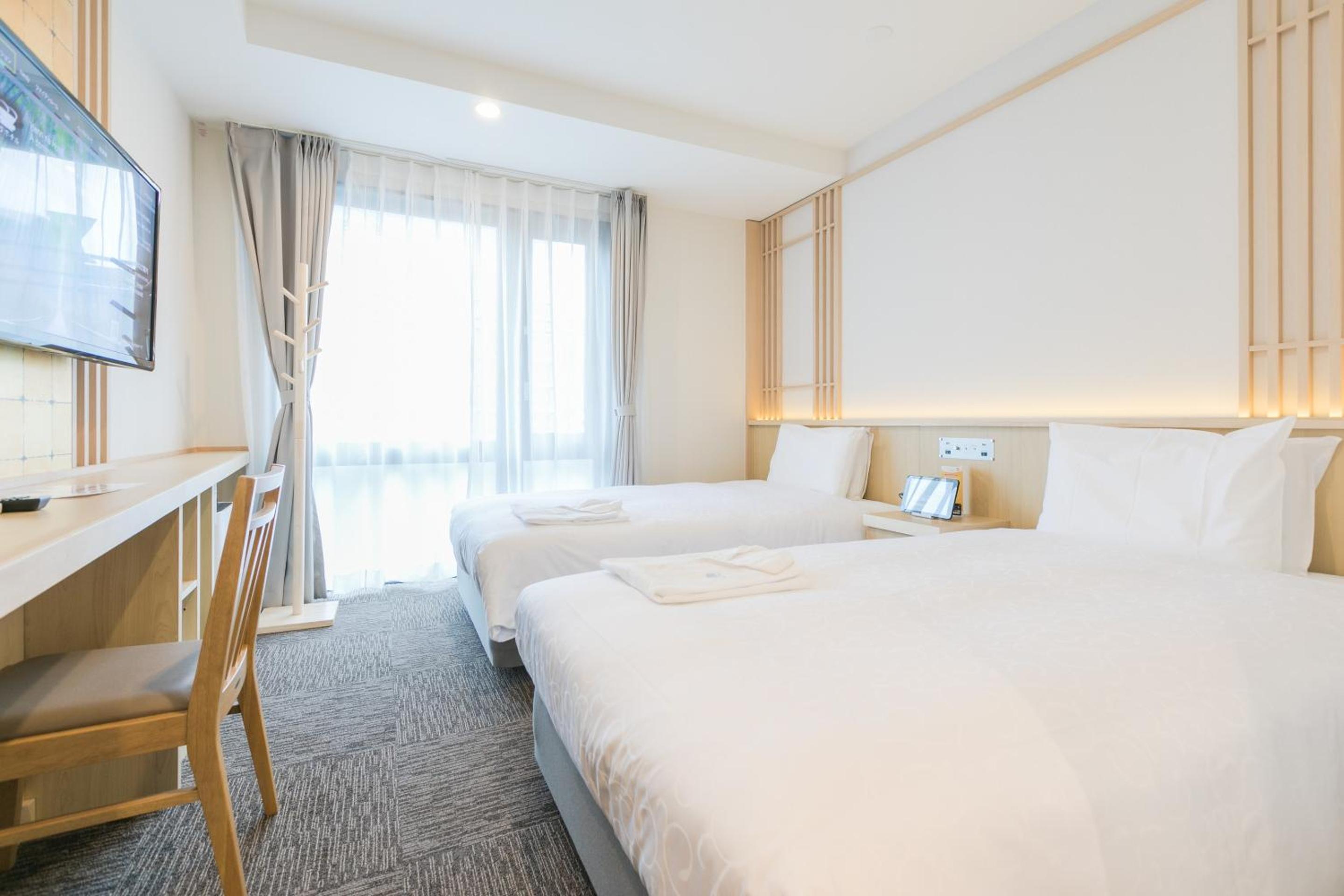 Phiten Twin Room - Photo 6