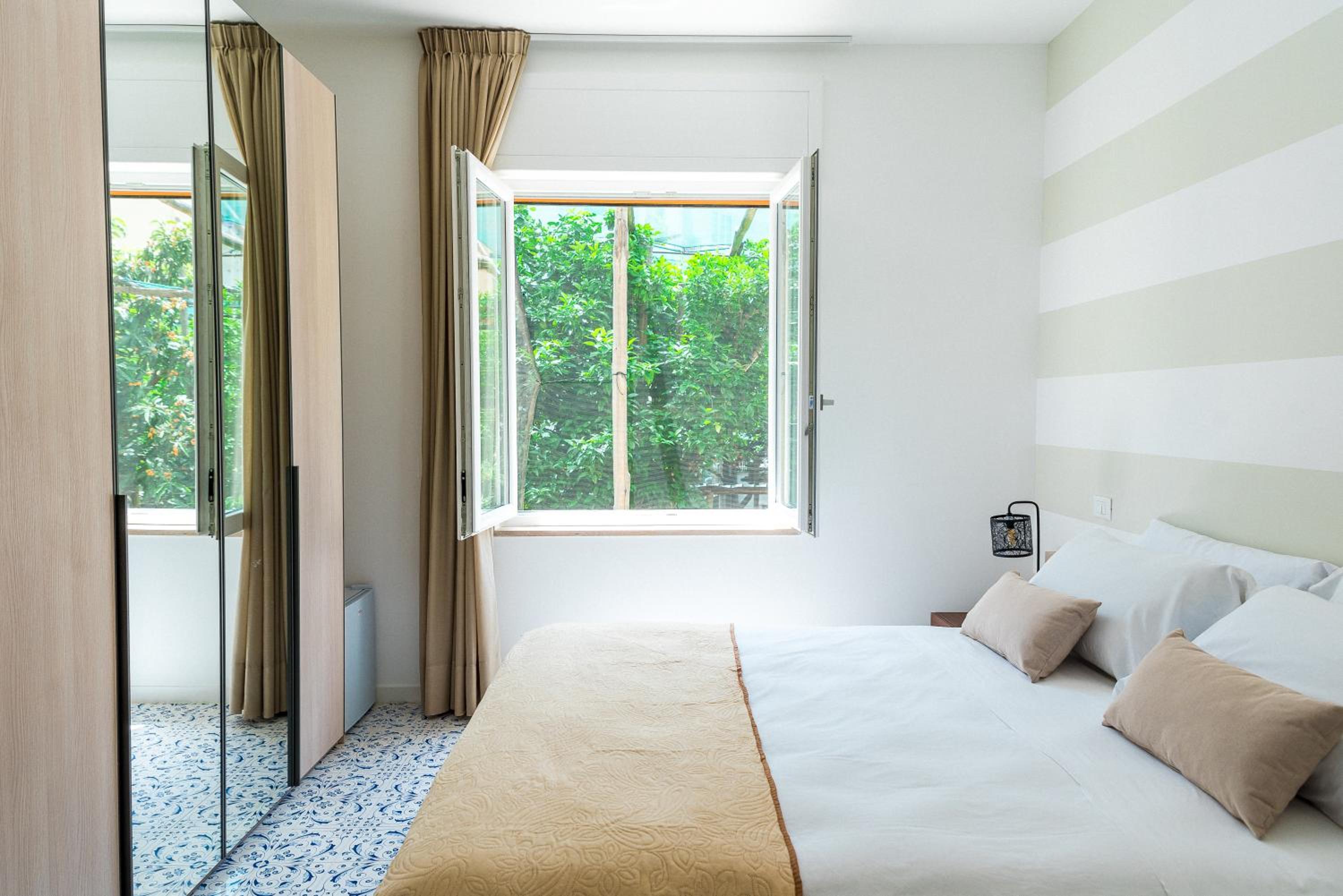 Deluxe Double Room with Balcony - Photo 1