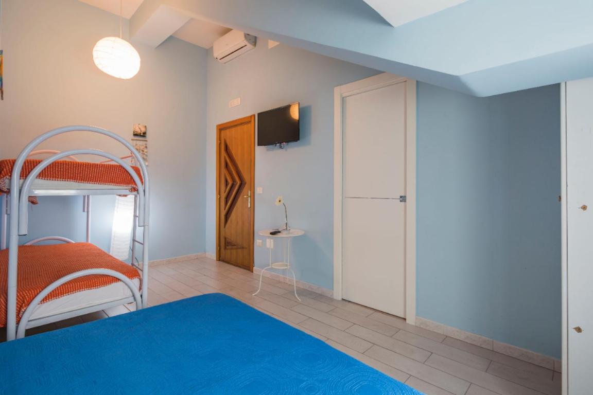 Quadruple Room with Private Bathroom