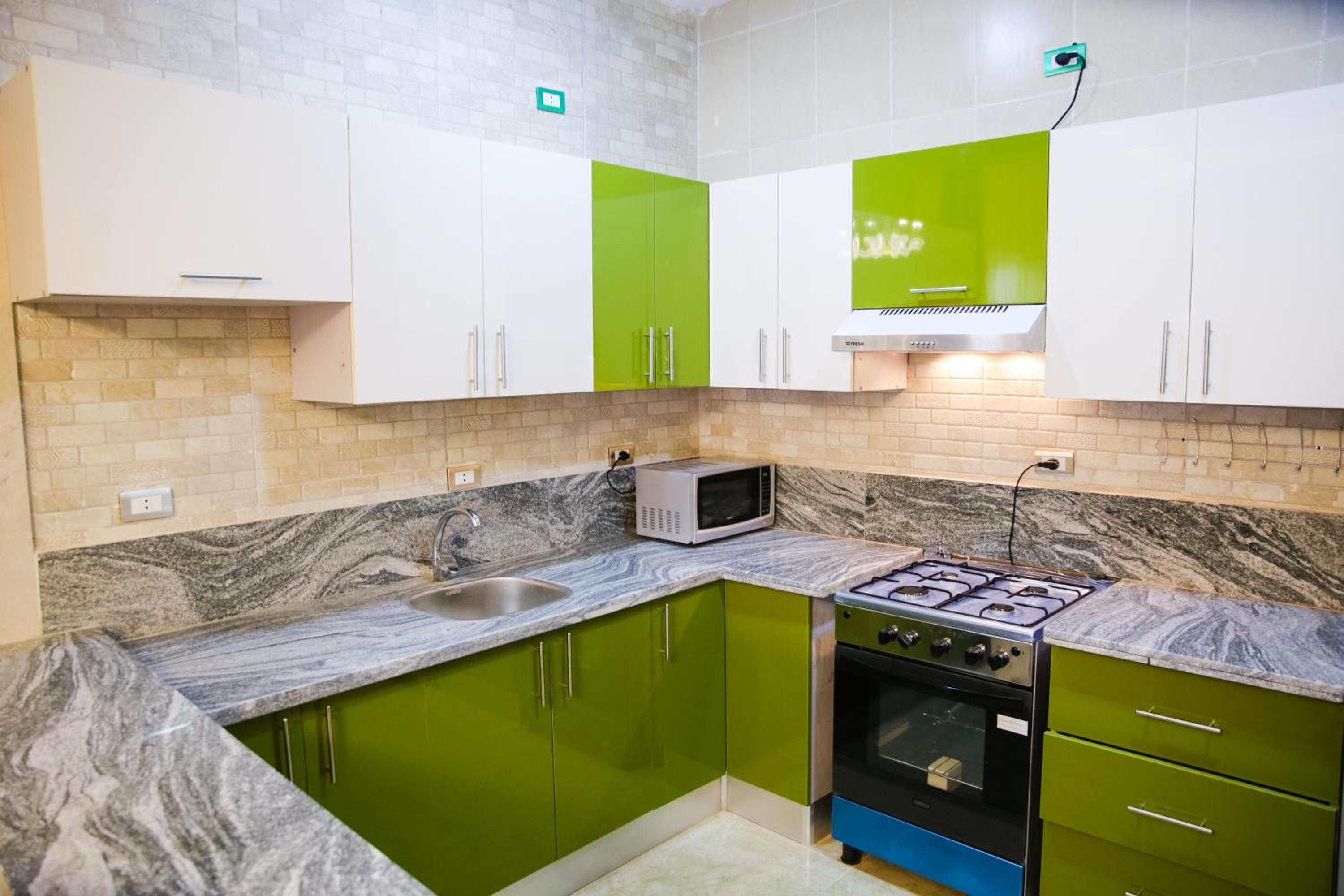 Three-Bedroom Apartment - Photo 27