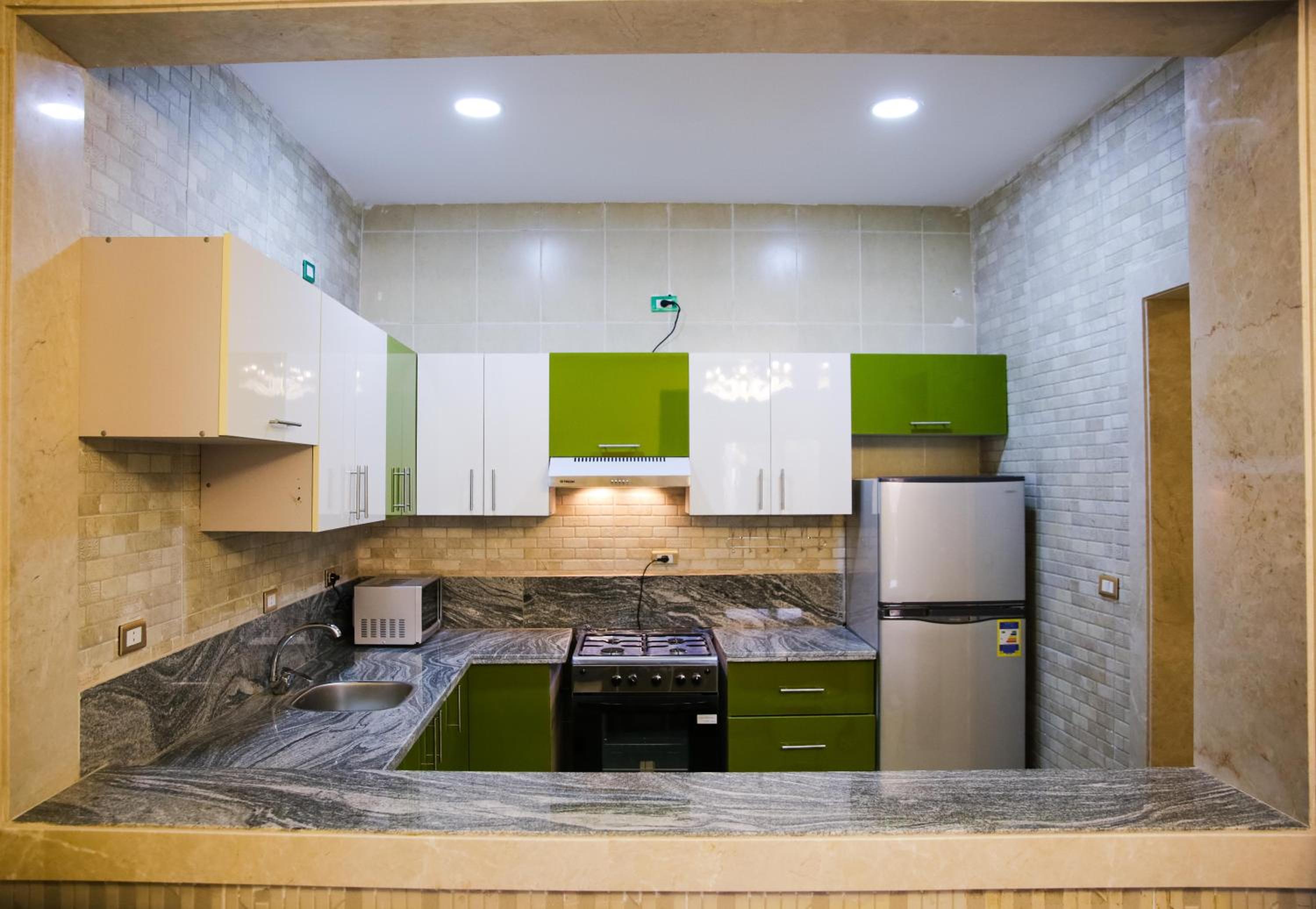 Three-Bedroom Apartment - Photo 30