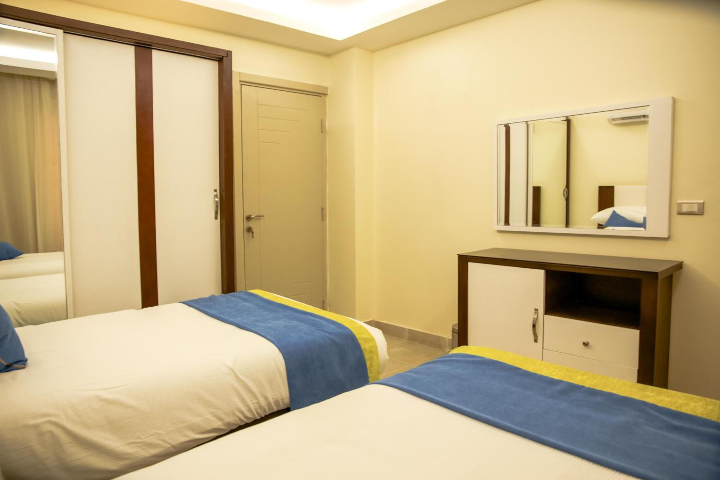 Three-Bedroom Apartment - Photo 1