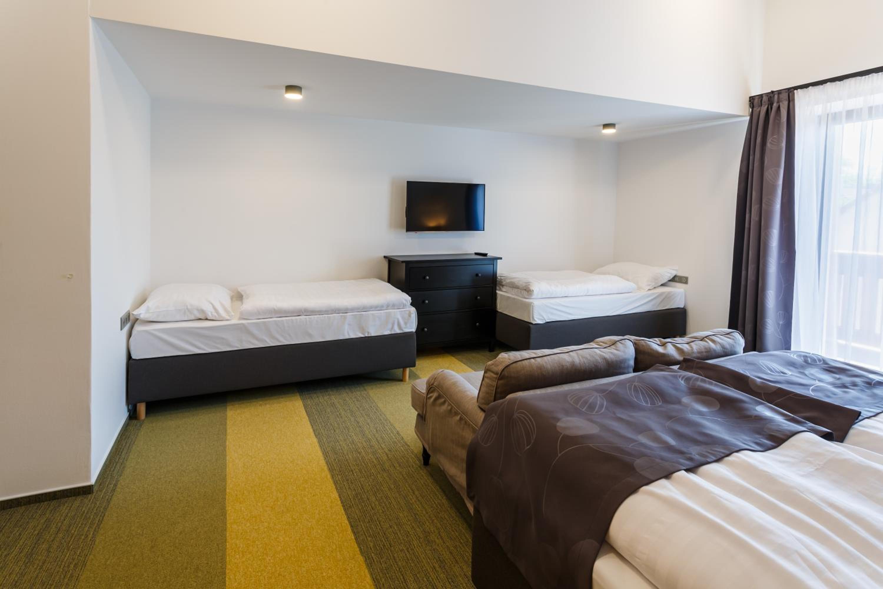Quadruple Room with Balcony photo 1