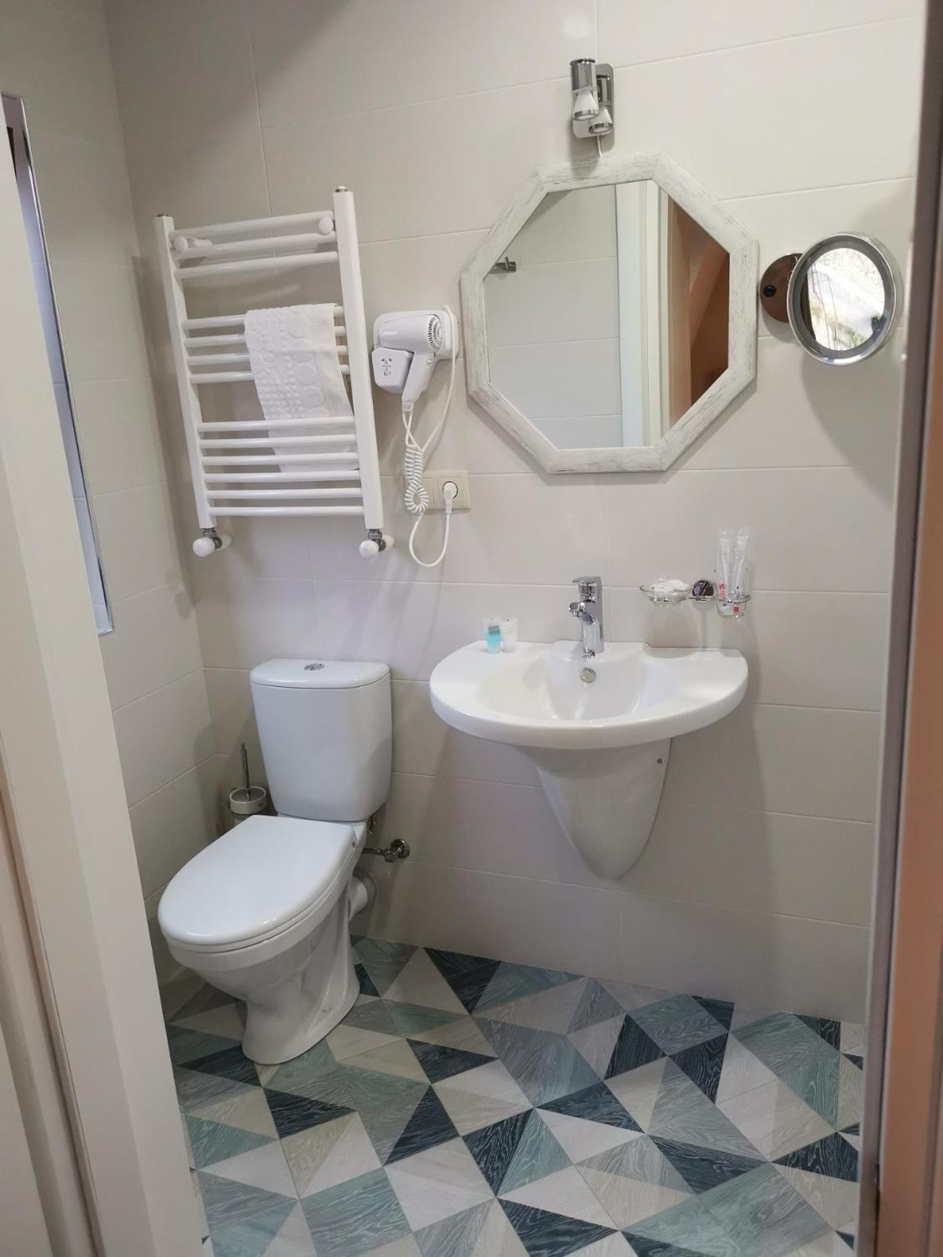 Deluxe Quadruple Room with Balcony photo 3