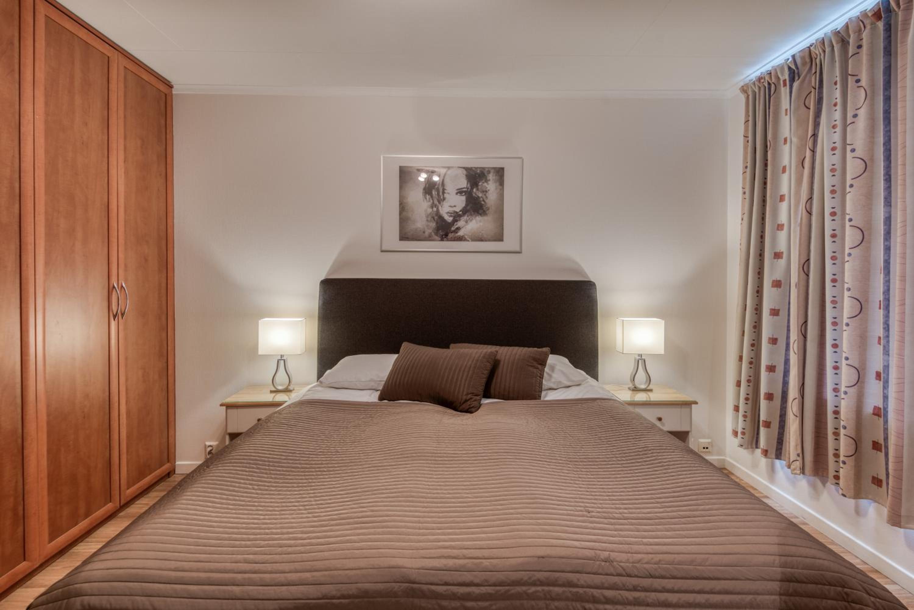 Three-Bedroom Apartment - Photo 2