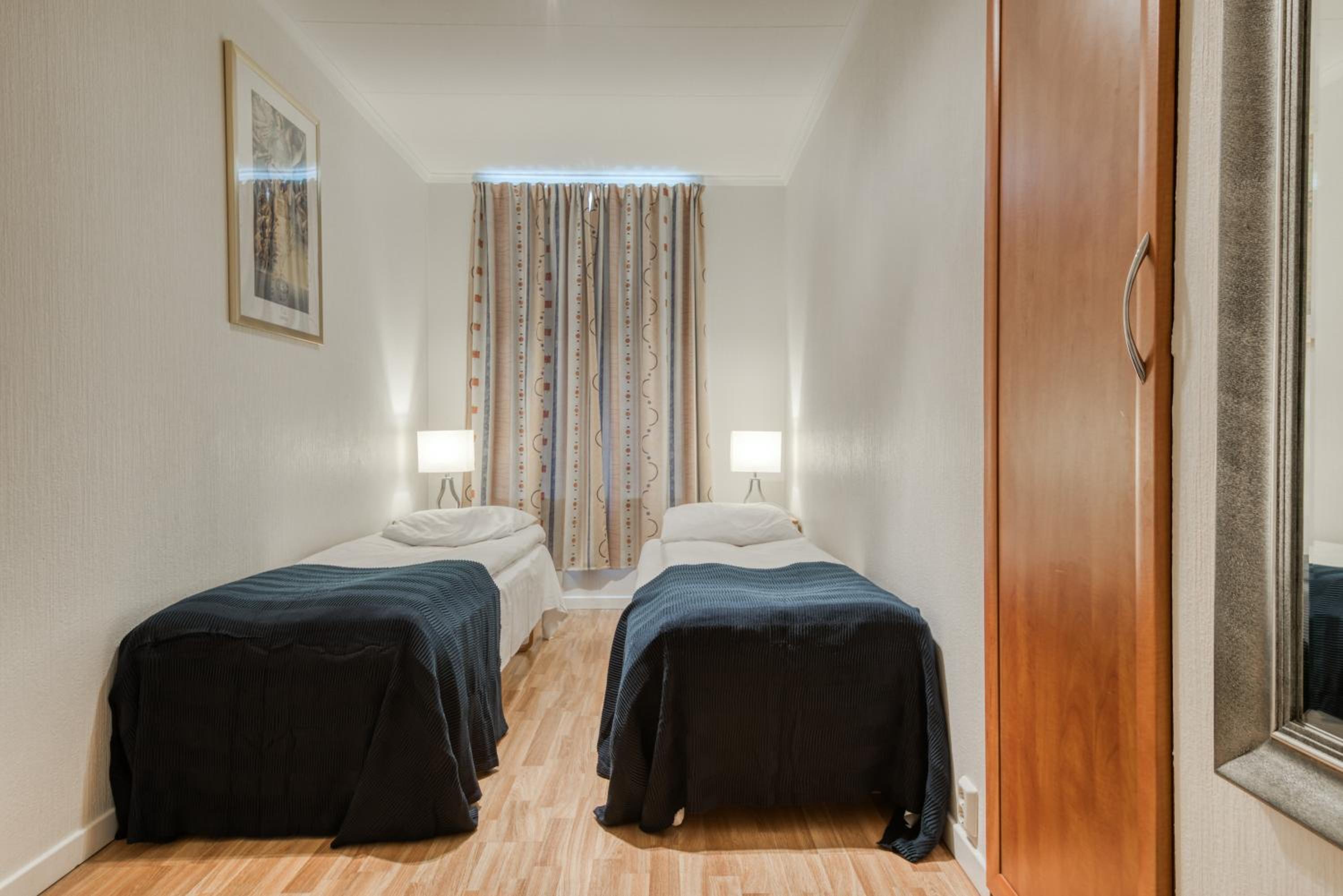 Three-Bedroom Apartment - Photo 7