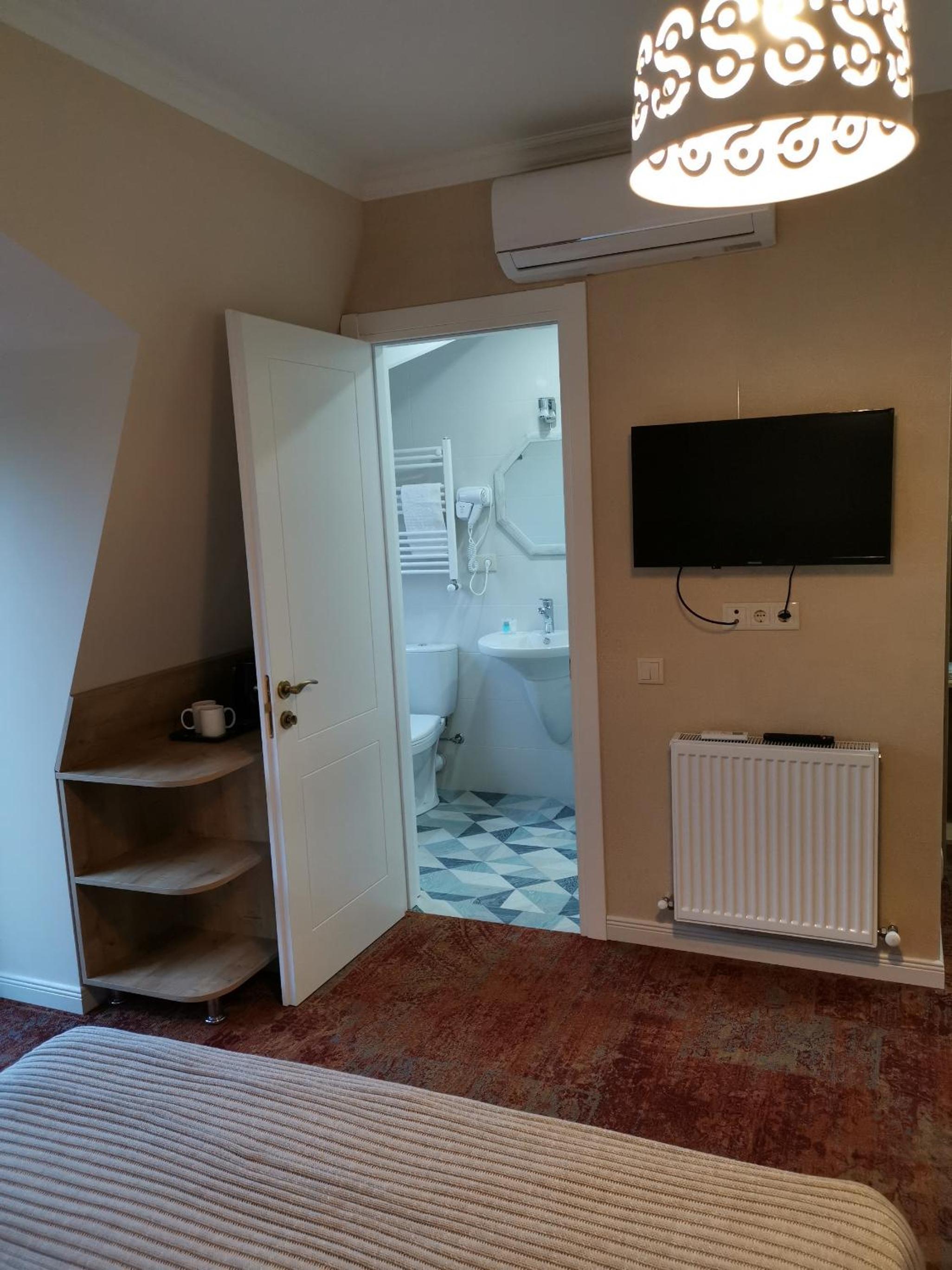 Deluxe Quadruple Room with Balcony photo 2