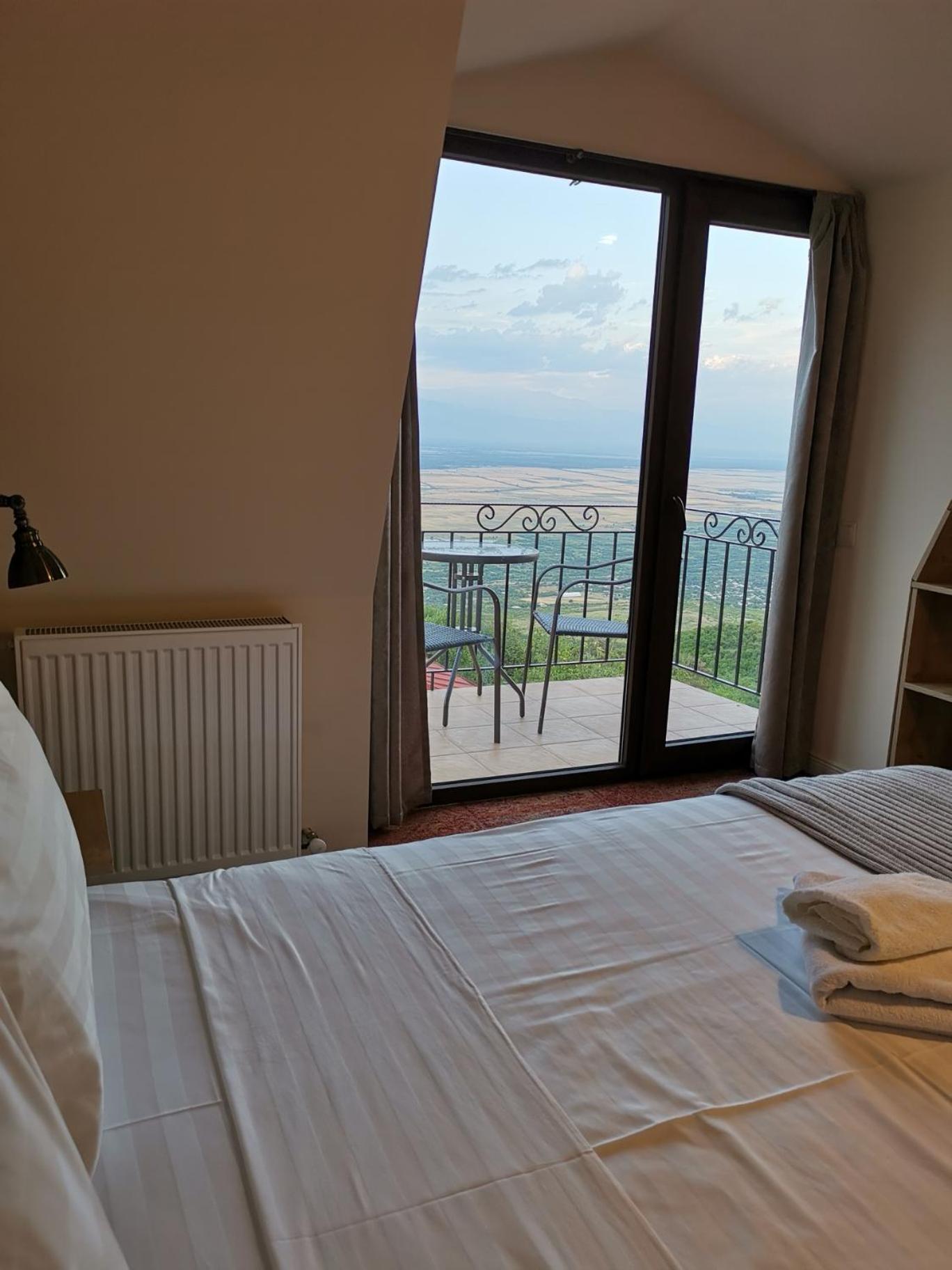 Deluxe Quadruple Room with Balcony